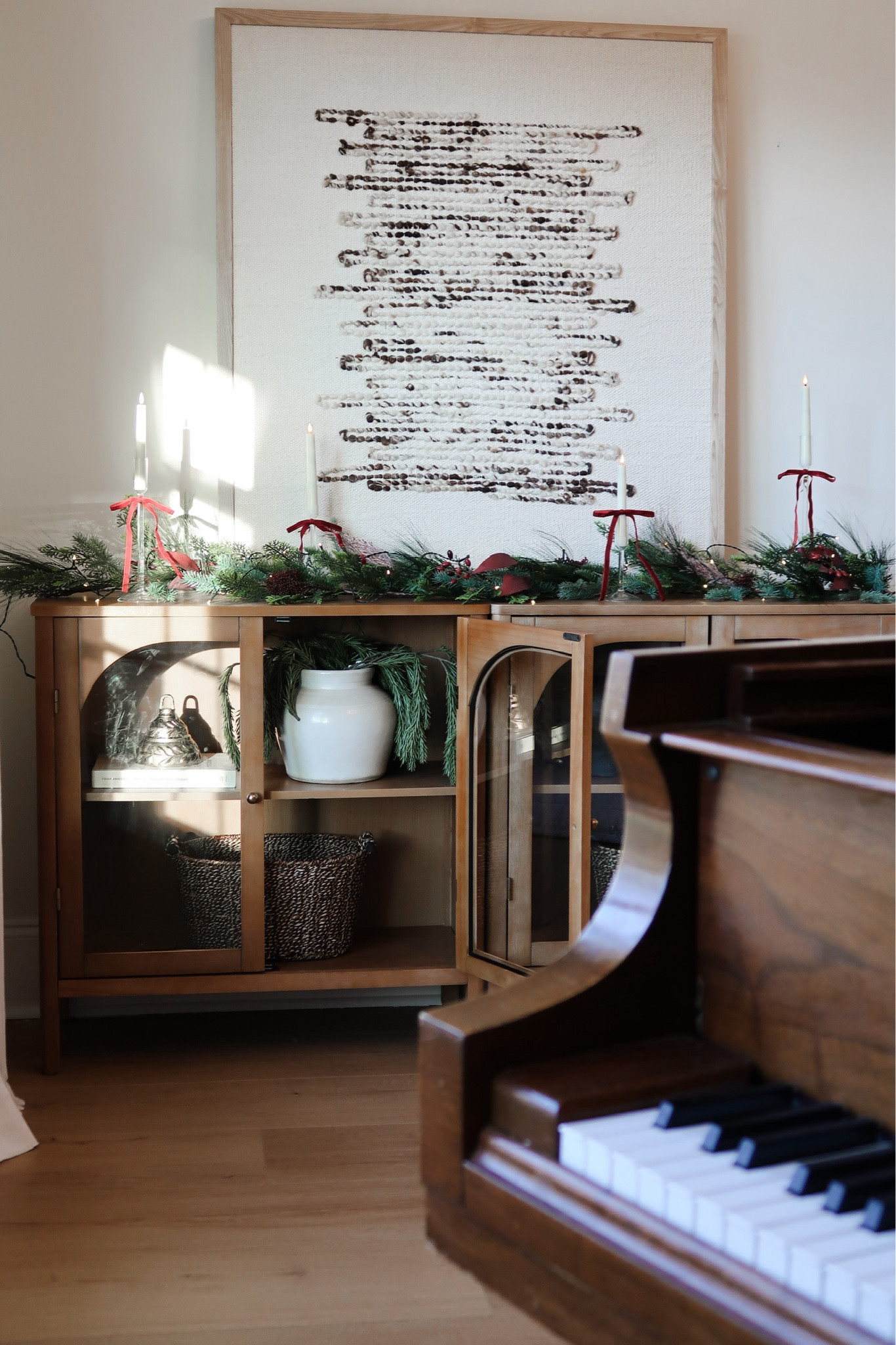 The way the morning sun comes into our Piano Room 🥹🌲☀️ Soooo beautiful!! And can we talk about these cabinets?!? The wood tone is even prettier in person! And they are on sale right nowwww! I have 2 pushed together!

Organic modern home, decor, piano room, wood cabinets, glass cabinets, Christmas styled, Christmas decor, organic modern Christmas. 

#LTKHoliday #LTKSaleAlert #LTKHome