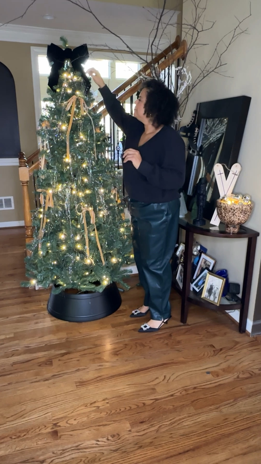 That transition from fall to Christmas decor happened quickly. Love this simple yet glam tree…and an outfit to match,
Tinsel Christmas Tree Velvet Bows Black Tree Black Tree Cuff Nutcracker 

#LTKHome #LTKSeasonal #LTKHoliday