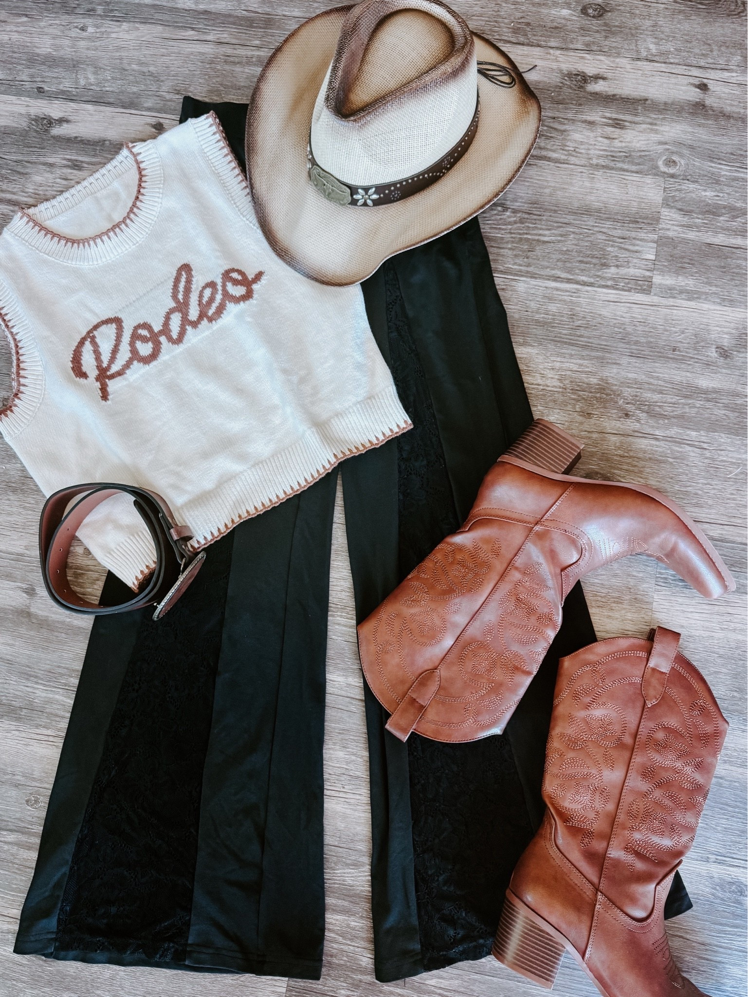 Country concert outfit inspo 🎶 This rodeo sweater vest is super soft and comfy and these lace embellished black pants are so unique! Wearing an xsmall in the top and small in the pants.

As an Amazon Influencer I earn commission on qualifying purchases.

Country concert outfit idea, mom style, spring concert look, rodeo top, black pants with lace, cowboy hat, brown cowboy boots, brown belt, summer concert outfit inspo

#LTKootd #LTKMidsize #LTKTravel