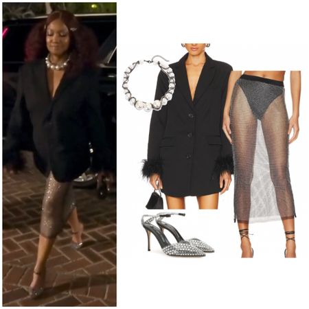 Garcelle Beauvais’ Black Feather Blazer, Sheet Crystal Embellished Skirt, Pearl Necklace and Embellished Ankle Strap Pumps