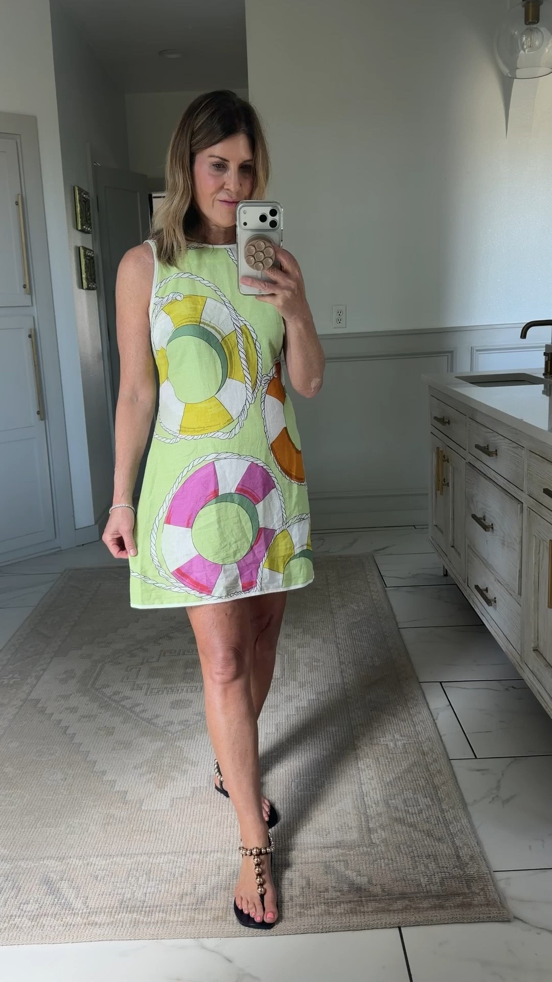 Wearing a size medium. I sized up one. Cute pool float dress I’m taking for vacation 
Last day with code SPOILEDHOME20

#LTKTravel #LTKOver40 #LTKSwim
