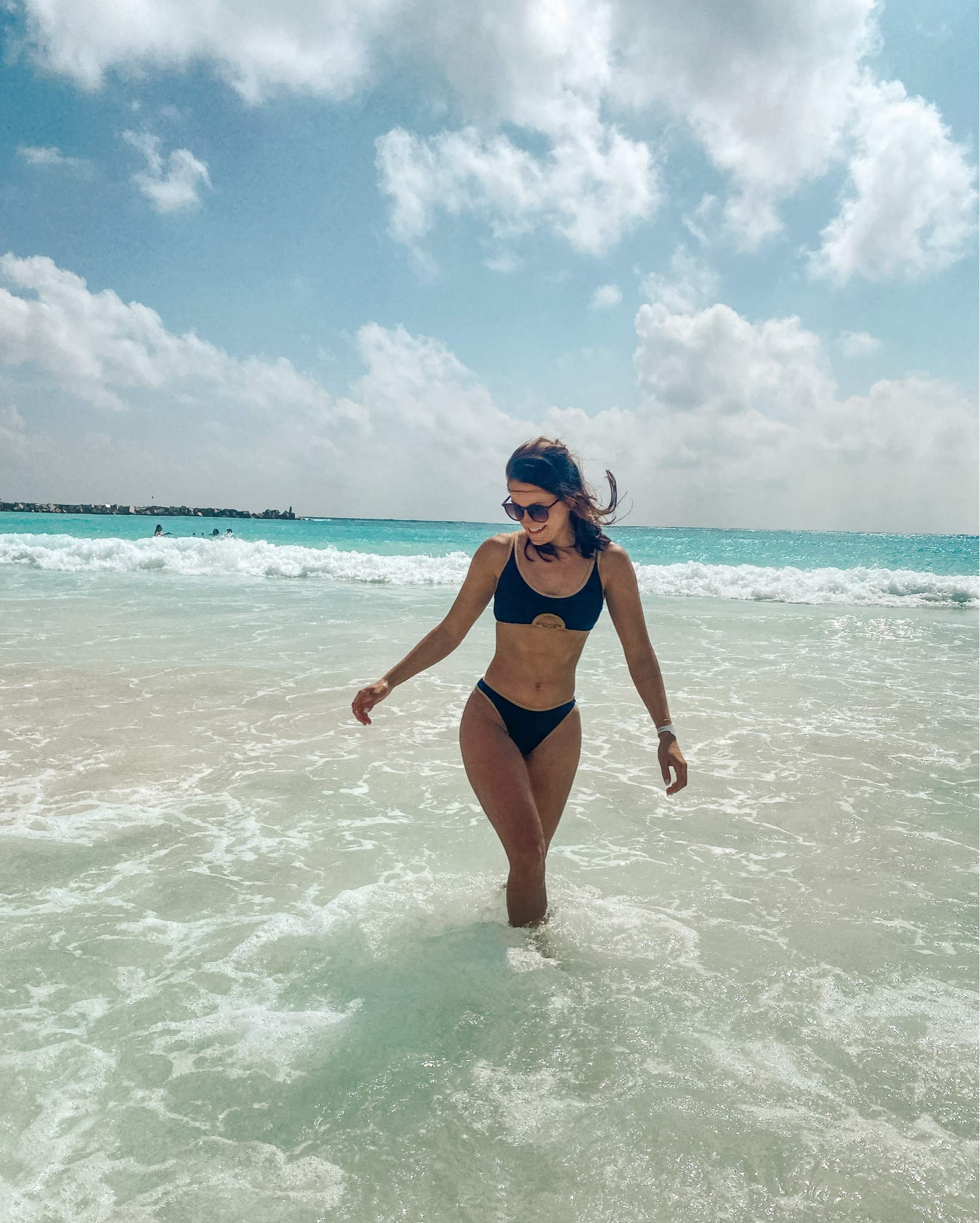 This black and tan bikini is simple but so cute! 🖤 The bottom is high cut and not too cheeky, and there is a metal detailing on the top that gives it a little edge. It’s sure to be appropriate for any swimming occasion! 

#LTKTravel #LTKSwim #LTKSeasonal