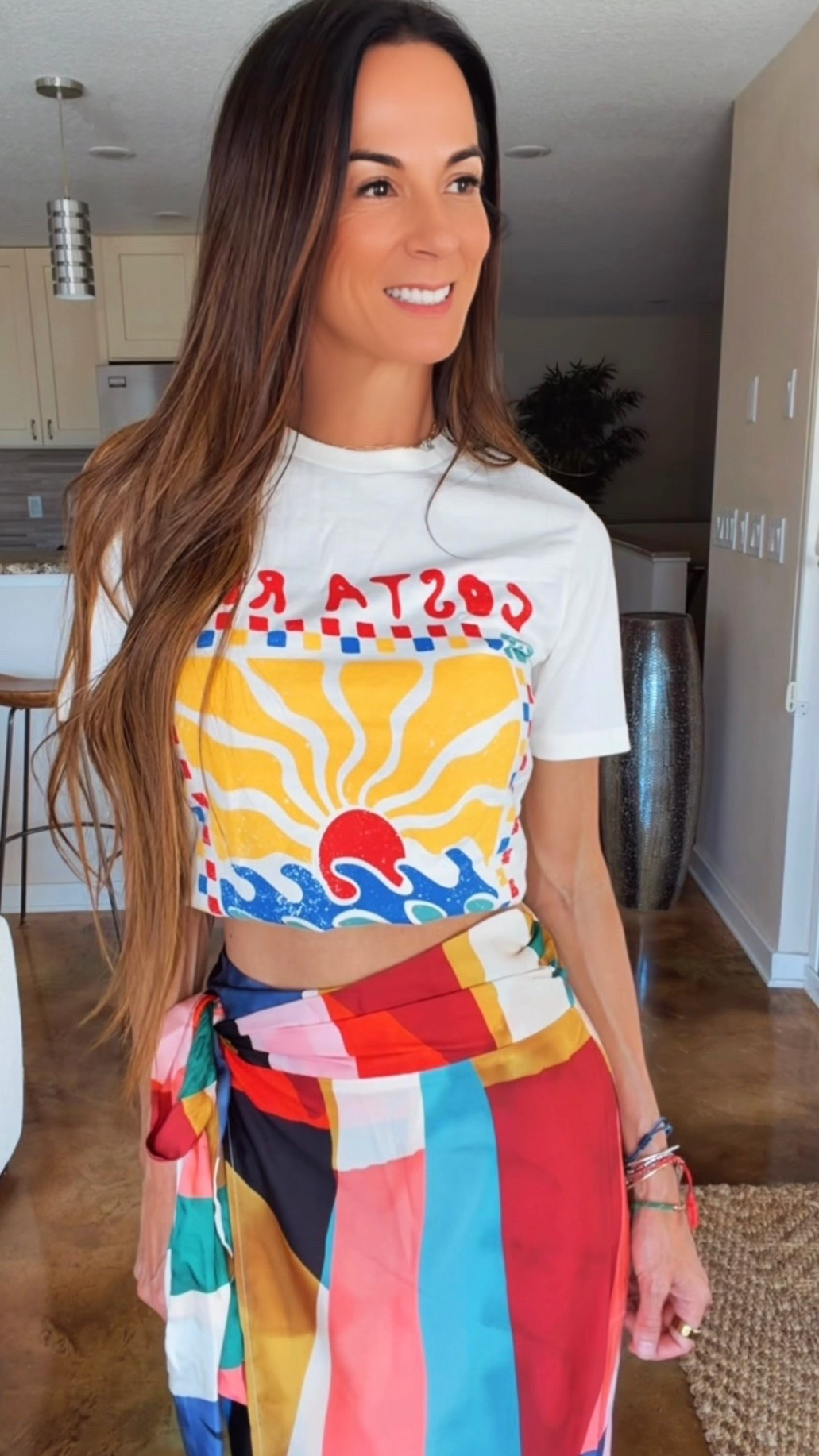 Color therapy but make it fashion 🌈✨
This silky wrap skirt + casual tee combo is giving “vacation energy with zero effort” and honestly… I’m obsessed. The bold colors, the flowy fit, the easy vibe — this is the kind of outfit that instantly puts me in a good mood 💃☀️

Proof that a simple tee and a statement skirt can absolutely steal the show. Paired it with oversized sunnies and a straw tote for the ultimate chic-but-fun summer look 🤍

And use code NICOLECOLEE35 for 35% off your order!

#ColorfulStyle #VacationStyle #SummerOOTD #ChicCasualStyle #NicoleColeeStyle

#LTKdayinmylife #LTKgrwm #LTKootd