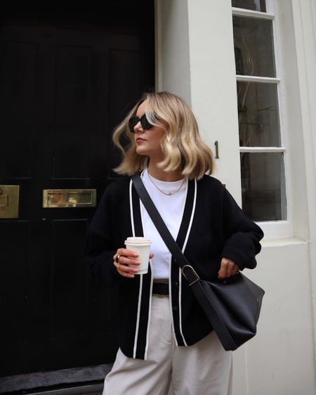 Office outfit, formal wear, ootd, black cardigan with stripe, beige trouser pants, black sunglasses, black crossbody bag 

#LTKstyletip #LTKeurope #LTKworkwear