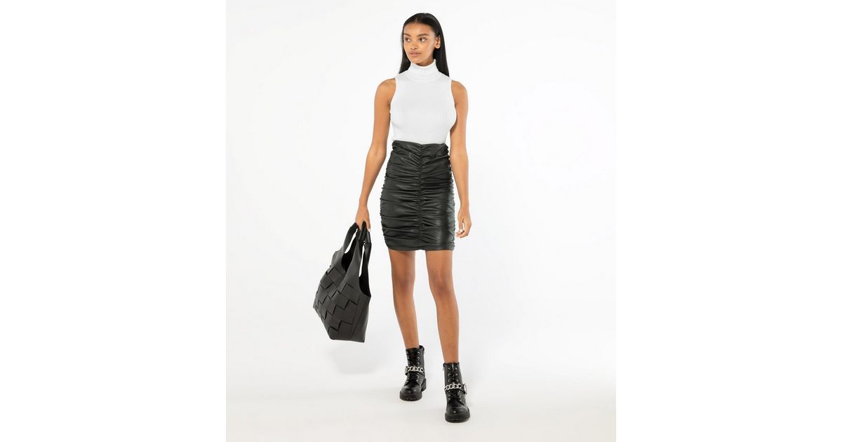 Cameo Rose Black Leather-Look Ruched Mini Skirt
						
						Add to Saved Items
						Remove from... | New Look (UK)