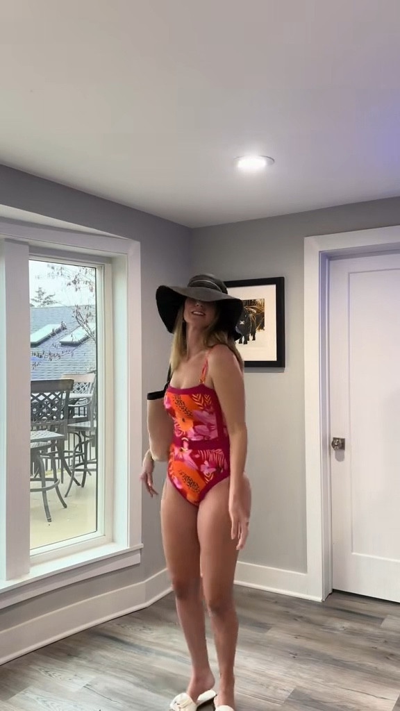 Trading the knits for this tropical dream! ☀️ I am officially in a vacation state of mind with this vibrant floral one-piece. There is nothing more unsettling for others than a woman who is comfortable in her own skin—and this bold cutout design definitely brings the confidence! Shop my favorite swim styles and this perfect beach tote on my LTK! 🛍️ #VacationStyle #SwimwearInspo #TropicalVibes #BeachDayEssentials @VICI 

Sun-Drenched Style Details
• Warm Floral Palette: The mix of bright oranges, pinks, and purples in the tropical print creates an eye-catching look that’s perfect for the beach or poolside.
• Structured Back Cutout: The back features a strategic cutout with a thin strap across the mid-back, adding a touch of edge to the classic one-piece design.
• The Perfect Carryall: Pairing the suit with a large canvas tote with black leather trim adds a practical yet chic element for all your seaside essentials.

floral one piece swimsuit, tropical print swimwear, cutout back bathing suit, high cut swimsuit, canvas beach tote, orange and pink floral, summer vacation outfit, poolside chic, beach accessories, LTKswim


#LTKTravel #LTKSpringSale #LTKootd

#LTKActive #LTKTravel #LTKSwim