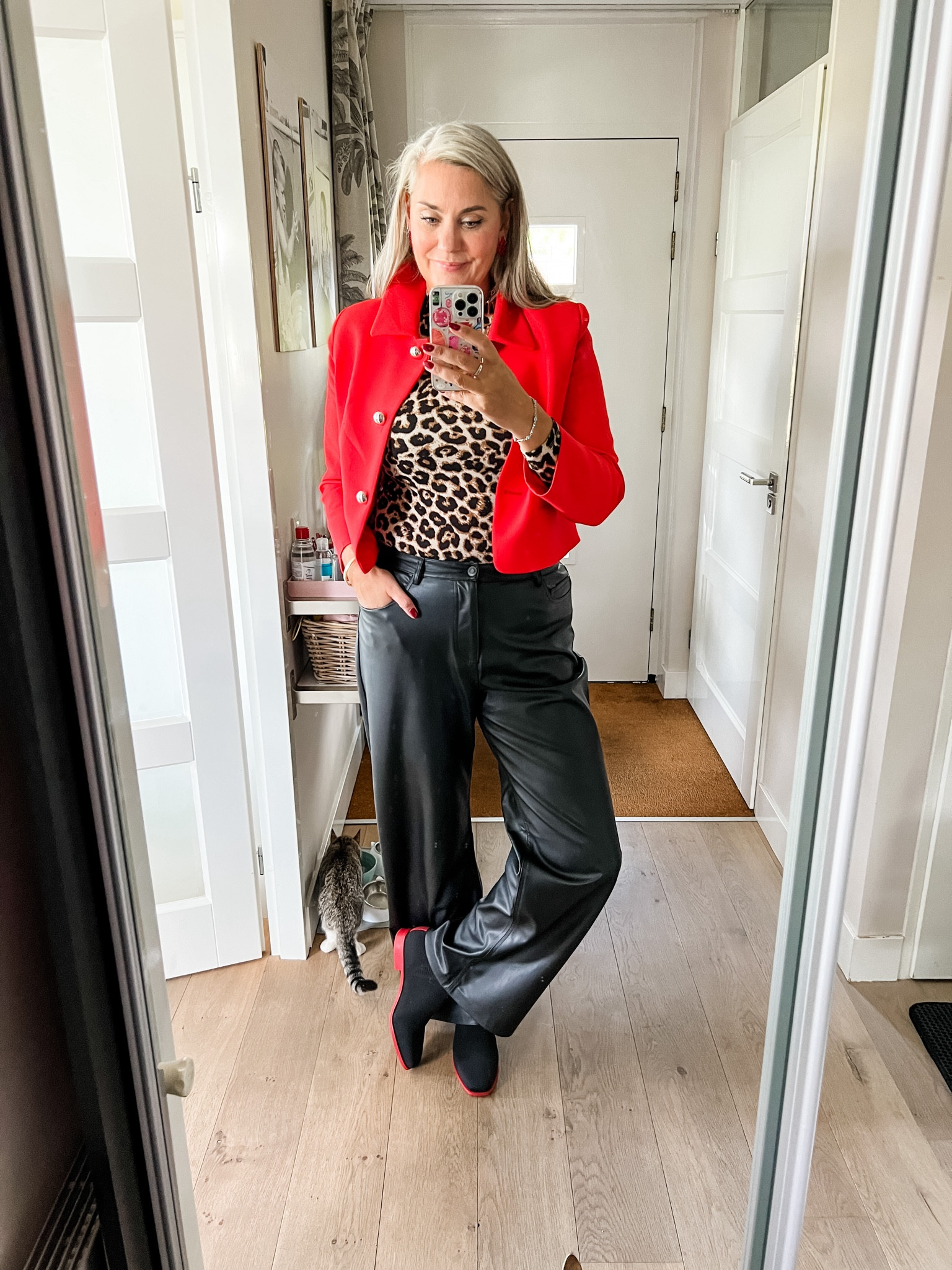 Ootd - Sunday. Red cropped blazer from Mango, leopard print mock neck top, wide leg faux leather trousers (old Zara) and black Vivaia Chelsea boots with a red sole. 

#LTKeurope #LTKnederlands #LTKshoes