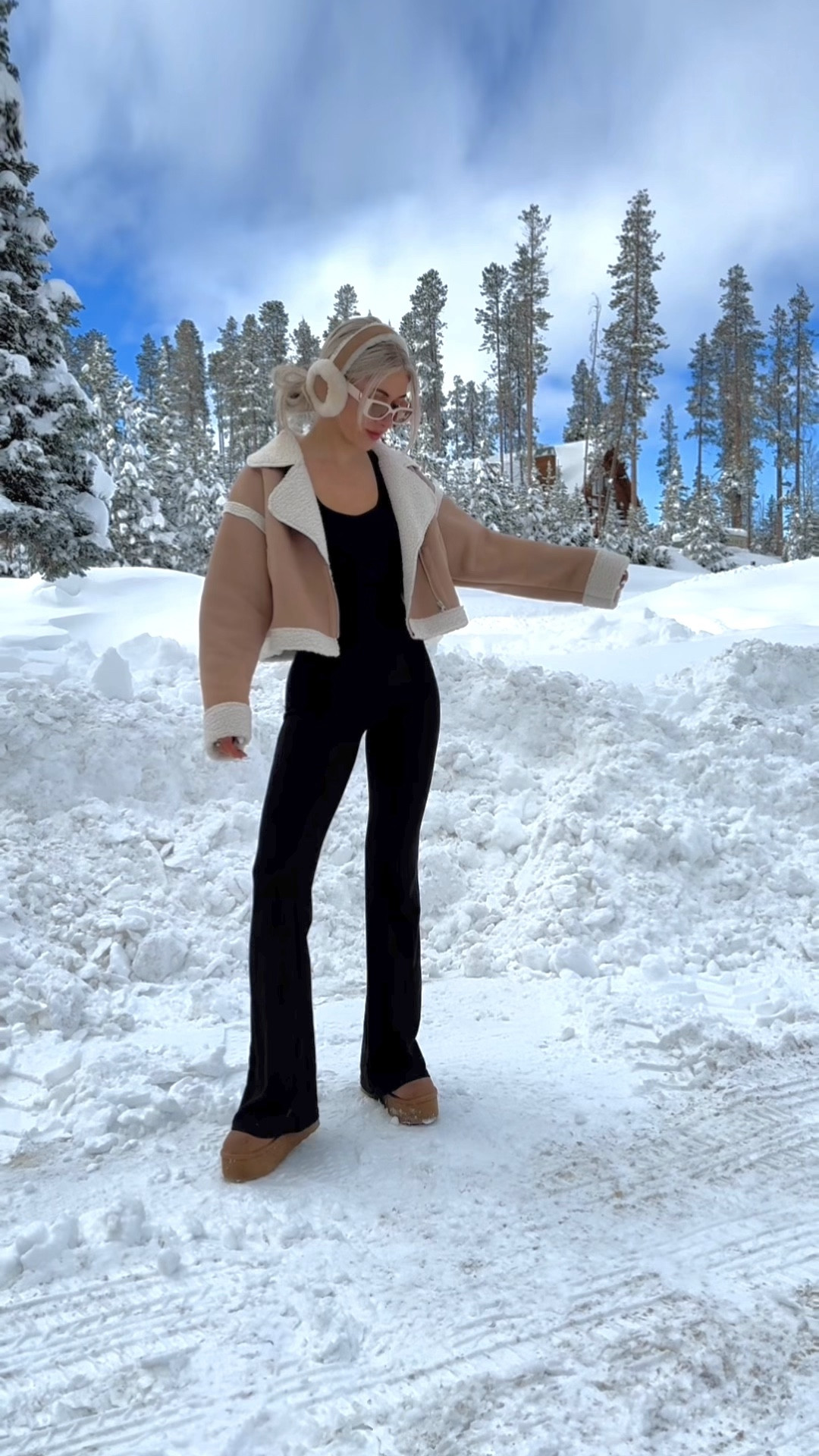 Fur trim coat, faux fur jacket, yoga bodysuit, flare pants jumpsuit, viral jumpsuit, cold weather style, teddy lined jacket, Pinterest outfit, cute winter outfits for snow, outfits to wear in the snow, soft feminine outfit, stylish snow outfit, snow outfit aesthetic comfy, flowy jumpsuit winter outfit, jumpsuit winter outfit, backless jumpsuit, full body onsie outfit winter, style a jumpsuit for winter, furry earmuffs, winter fashion trends, platform ugg minis, Ugg dupes

#LTKbeauty #LTKSeasonal #LTKstyletip