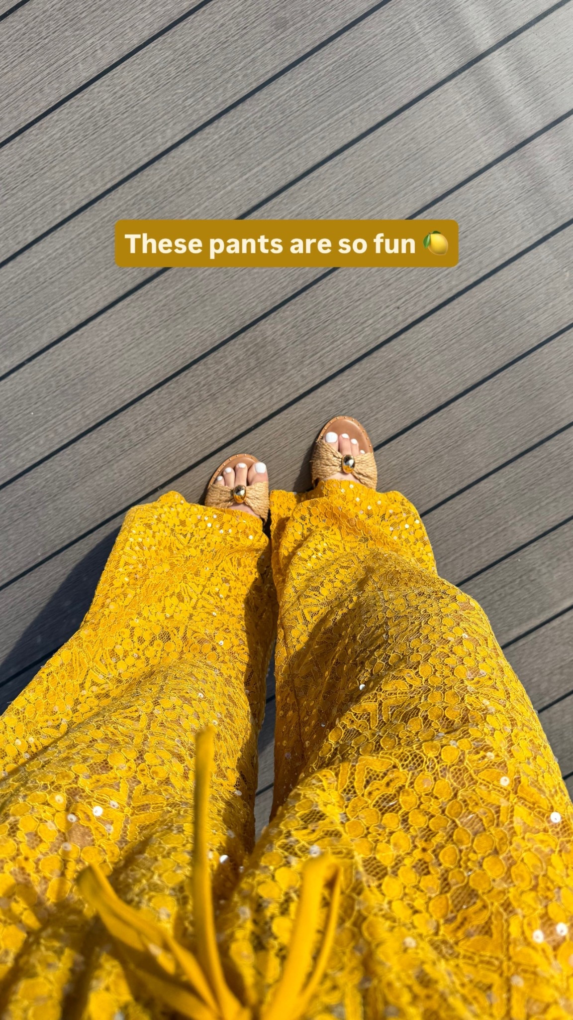 OBSESSED with these yellow gold sequin lace pants from Petal and Pup. So much more fun than a traditional cover up! 