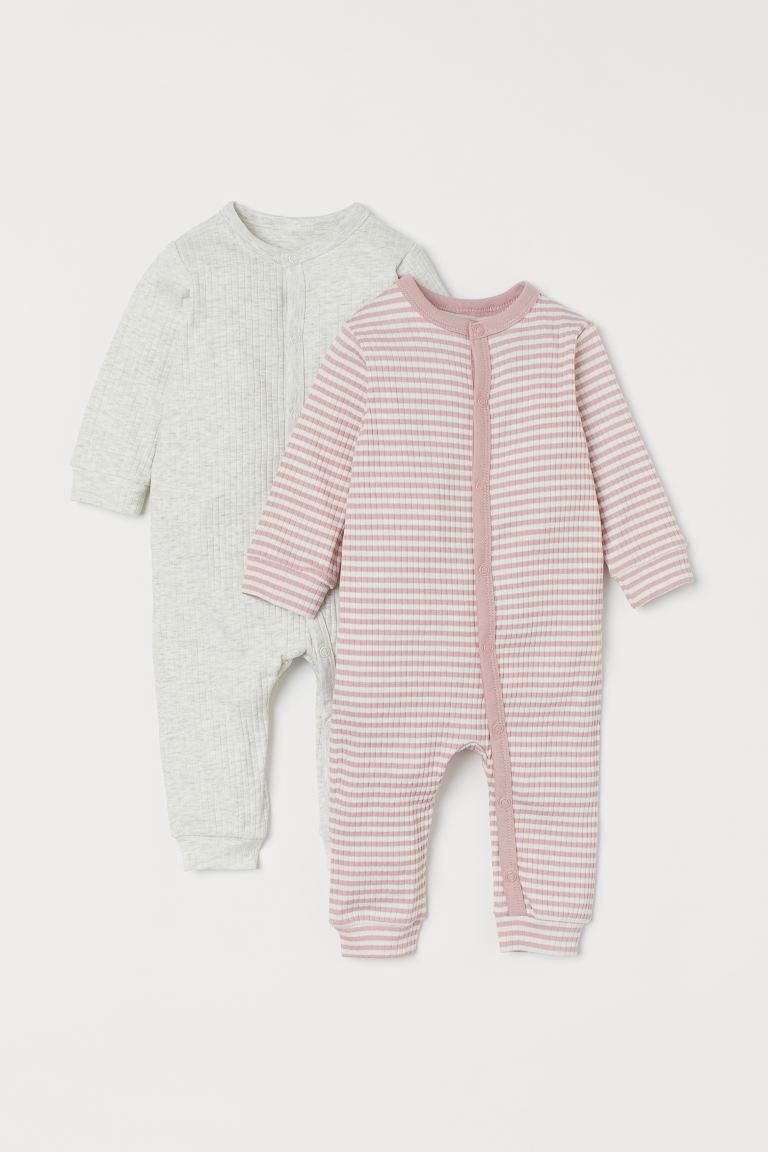 Pajama jumpsuits in soft, ribbed organic cotton jersey. Long sleeves and ribbing at neckline, cuf... | H&M (US + CA)