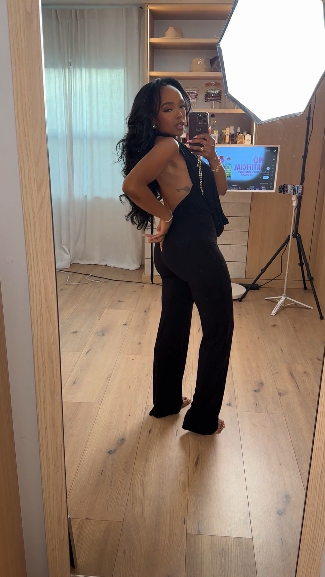 Scroll to shop!! This all-black outfit featuring a draped sleeveless top paired with flattering fitted pants is perfect for dinner dates, nights out, travel outfits, or an elevated everyday look.

#LTKootd #LTKgrwm #LTKPetite