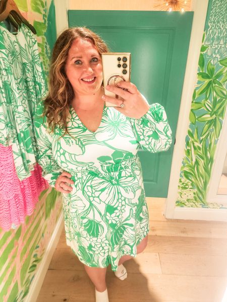 We stopped at Lilly Pulitzer in Disney springs. They had a GREAT selection in XL, 16, and XXL. so thank you Disney Springs! I saw a LOT of the Disney x Lilly print at the parks. P.s. it was 40% off at Disney springs so my daughter and I got things. which FYI why are there not child and men Disney x Lilly ? This is the Calla Dress in a size LARGE print Spearmint Oversized Kiss My TulipsI prefer this dress in an XL just for the room but note the Large fits. So you can likely size down. I also prefer the hot pink print in the dress currently available over this one. There Is too much white IMO #livinglargeinlilly #lillypulitzer #plussize 

#LTKmidsize #LTKplussize #LTKtravel
