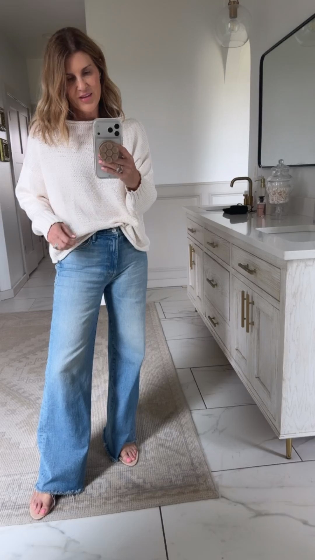 Sized up to a medium sweater 
Size 27 mother jeans 

#LTKOver40