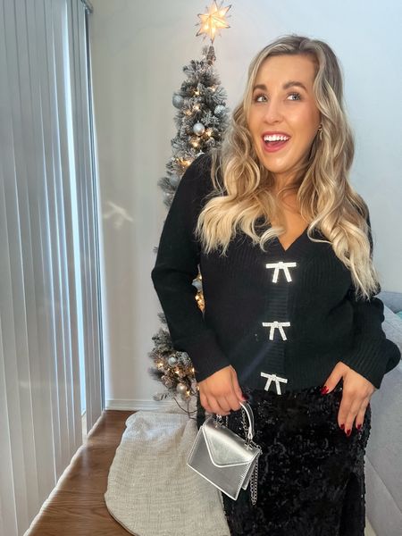  Embellished Bow Button Front Cardigan on sale now!

Casual holiday outfit
Sequin maxi skirt
Sequin midi skirt 

Rhinestone Heel Mules
Pearl trouser pants 

#LTKHoliday #LTKstyletip #LTKSeasonal