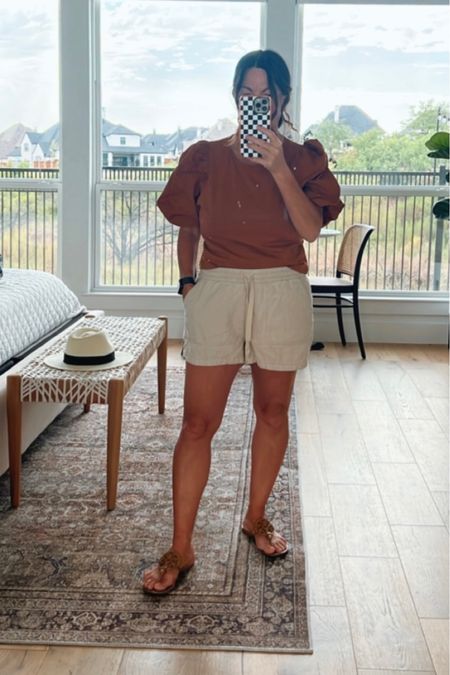 Casual outfit of the day. I’m wearing small in shorts   They are on sale too

Tan shorts, puff sleeve top. Linked similar top. Mine is sold out. Love these comfy linen shorts, Tory Burch sandals, checkered phone case, fall outfit

#LTKshoecrush #LTKsalealert #LTKFind