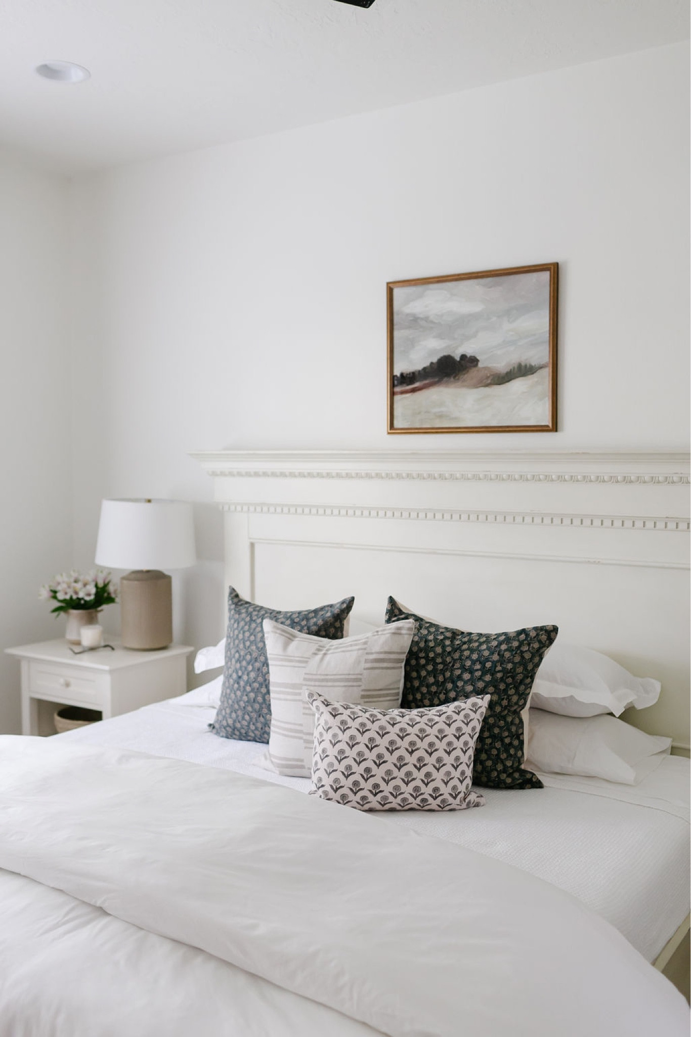 In our primary bedroom, I added a few pillows in spring to summer colors and a piece of artwork above the bed.


#LTKSeasonal #LTKhome #LTKFind