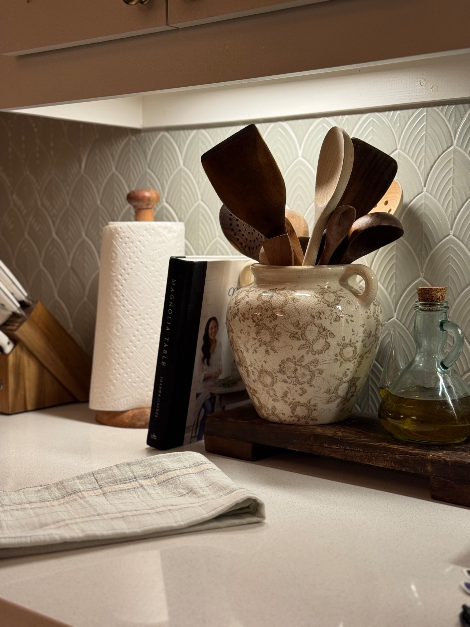 Wood riser, kitchen counter styling, home decor, kitchen inspo, wooden utensils, knife set, kitchen towels, glass oil dispenser, backsplash, 

#LTKHome #LTKmomlife #LTKfoodie