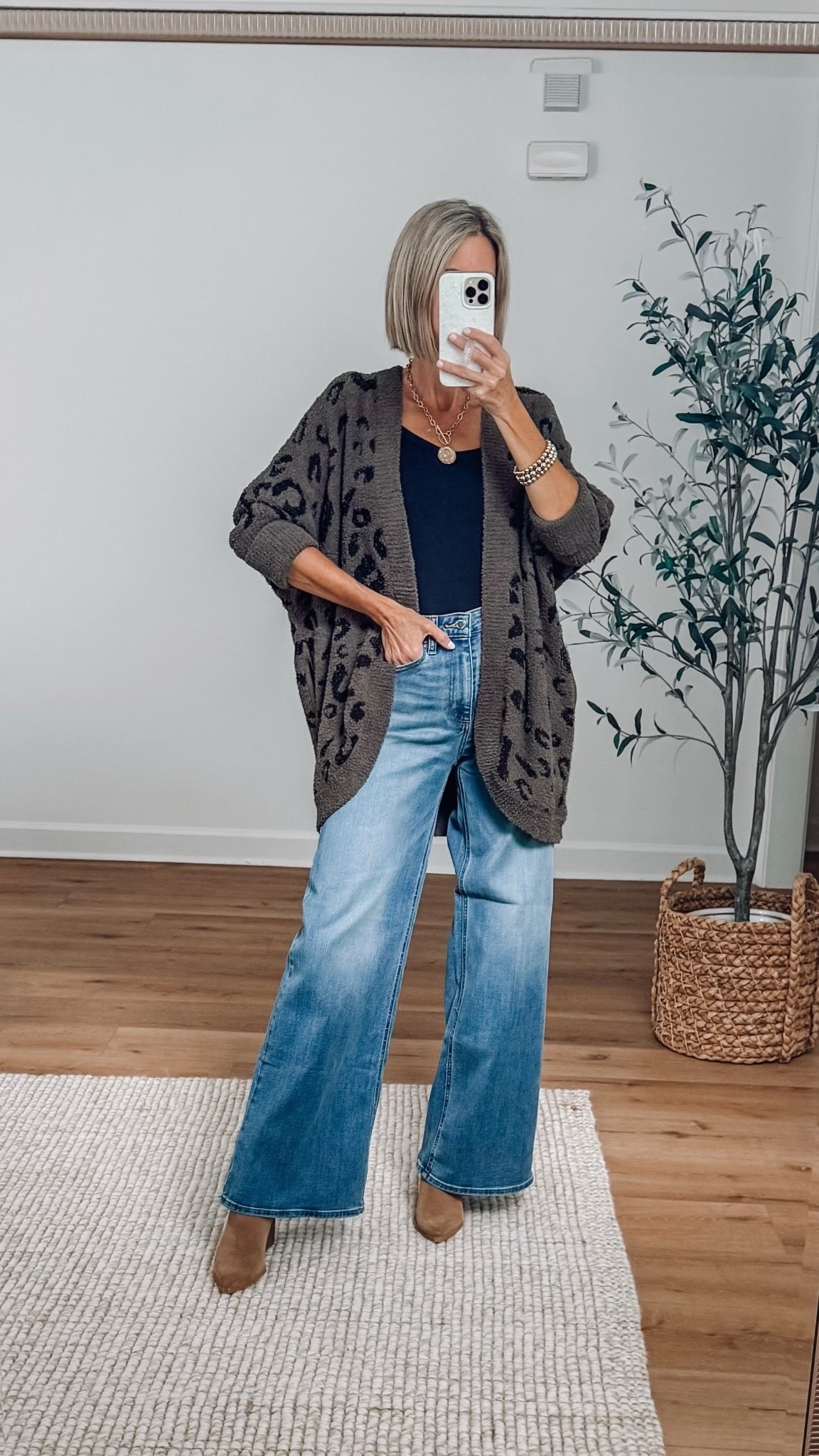 Amazon leopard print cardigan with pockets so cozy and warm! wearing a small, high rise wide leg Jeans - wearing a size 8 

#LTKFindsUnder50 

#LTKSeasonal #LTKootd #LTKgrwm