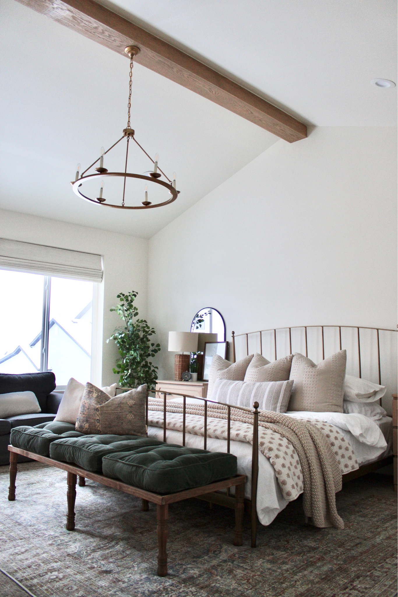 Our bedroom is finally more put together, complete with our Cariloha sheets. Budget friendly bedding and decor for the master bedroom. Woven wood roman Shade color is Holland ice. #masterbedroom #lumbarpillow #europillow #daybed #chandelier #brassbed #ficustree #studiomcgee #threshold #target #targetcircleweek #oakbeam 

#LTKsalealert #LTKFind #LTKhome