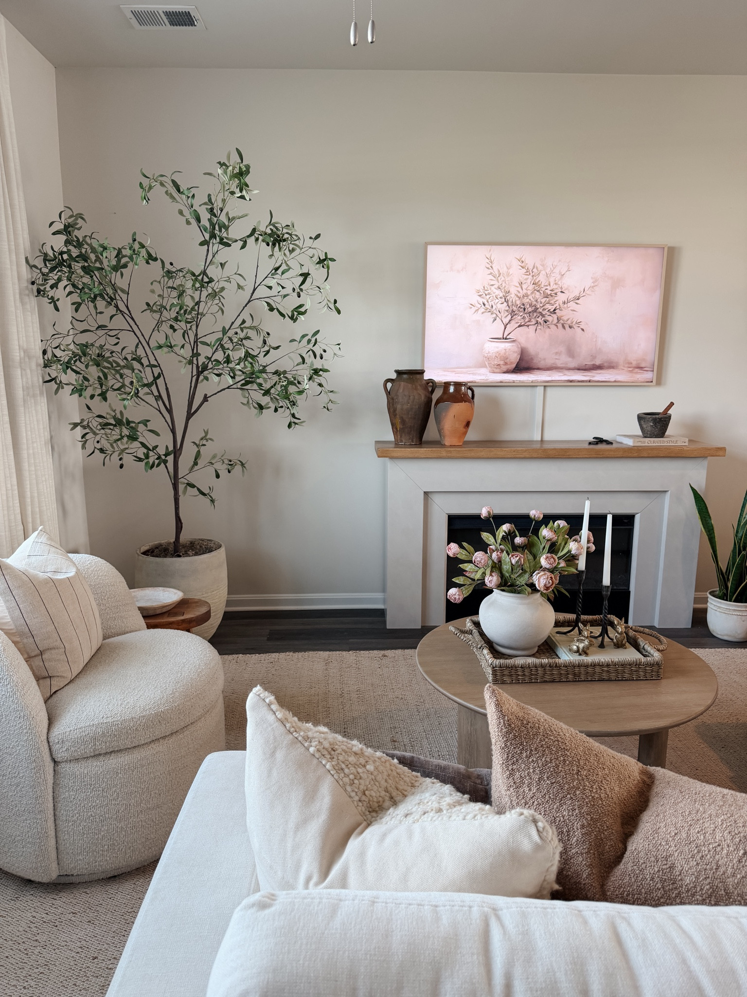 A warm, neutral living room that feels collected, cozy, and effortlessly elevated 🤎 I’m loving the mix of soft textures, natural wood tones, vintage-inspired accents, and earthy neutrals. So many simple details that make a space feel expensive without actually being it.

🏷️ neutral living room, cozy living room, organic home decor, warm neutral home, living room inspiration, cozy home decorating, elevated home decor, designer look for less, neutral home decorating, organic modern decor

#LTKHome #LTKSeasonal #LTKSaleAlert