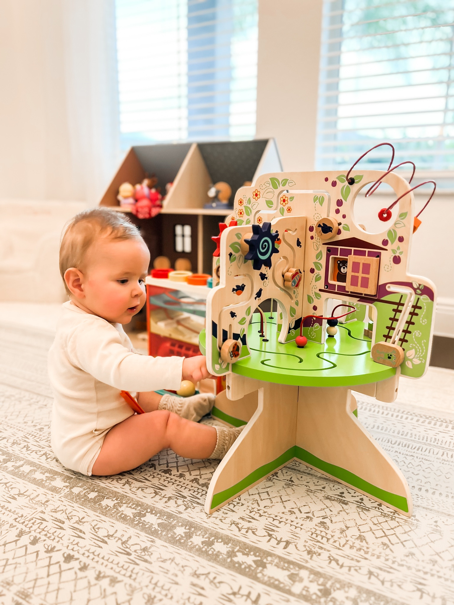 Wooden activity play 

#LTKbaby
