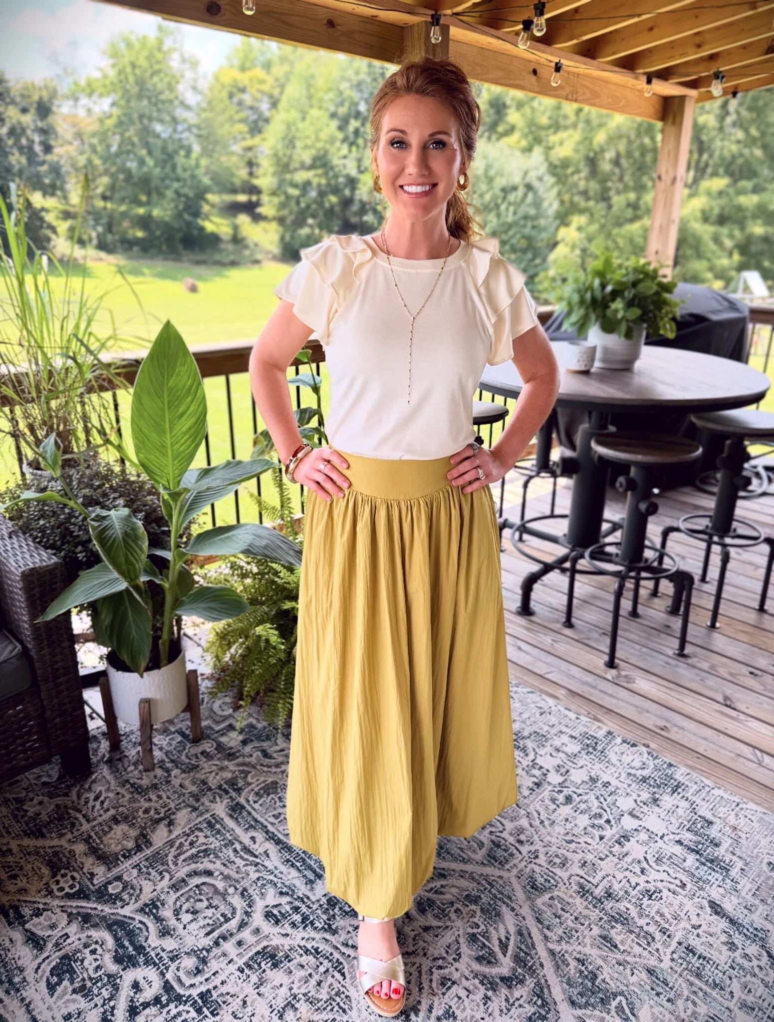 This bundle hem maxi skirt is so trendy and a great piece to have in your closet! Stephanie is wearing a small and it comes in multiple colors. She’s wearing a small in the ruffle sleeve top in the color apricot, but it comes in several colors too. 

#LTKWorkwear #LTKStyleTip #LTKPetite