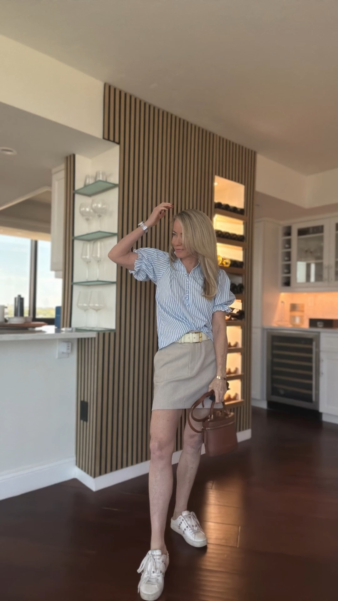 Easy, polished everyday outfit 🤍
Wearing a striped blouse with a neutral mini skirt and my go-to white sneakers.
Everything is comfortable, flattering, and easy to mix and match.

#LTKOver40 #LTKootd #LTKSeasonal