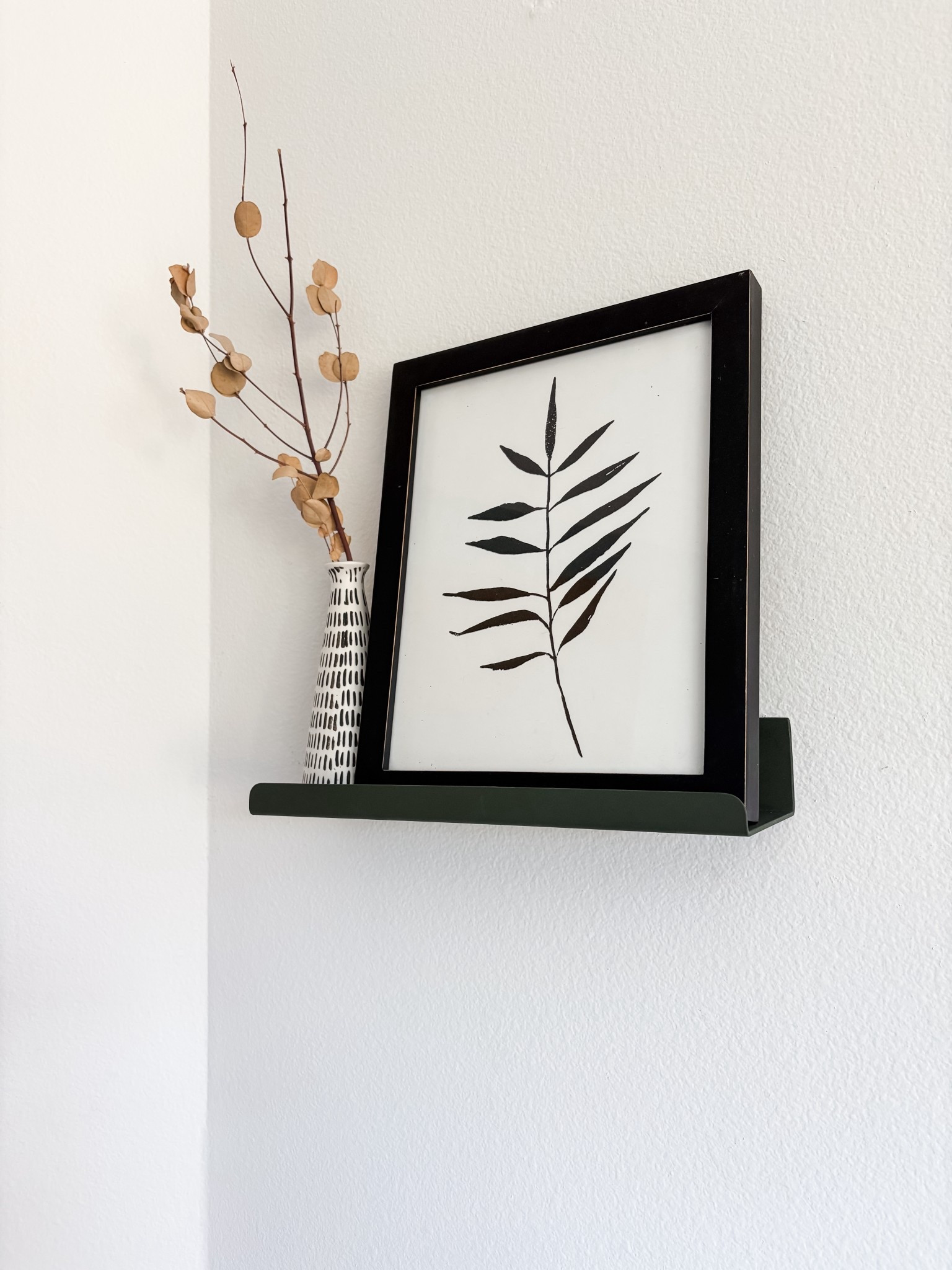 Olive green is my new favorite color and I’m loving these green metal wall shelves that add a little bit of classic color and perfect for displaying photos. They come in longer links. I bought a small one for a little wall shelf 

#LTKHome