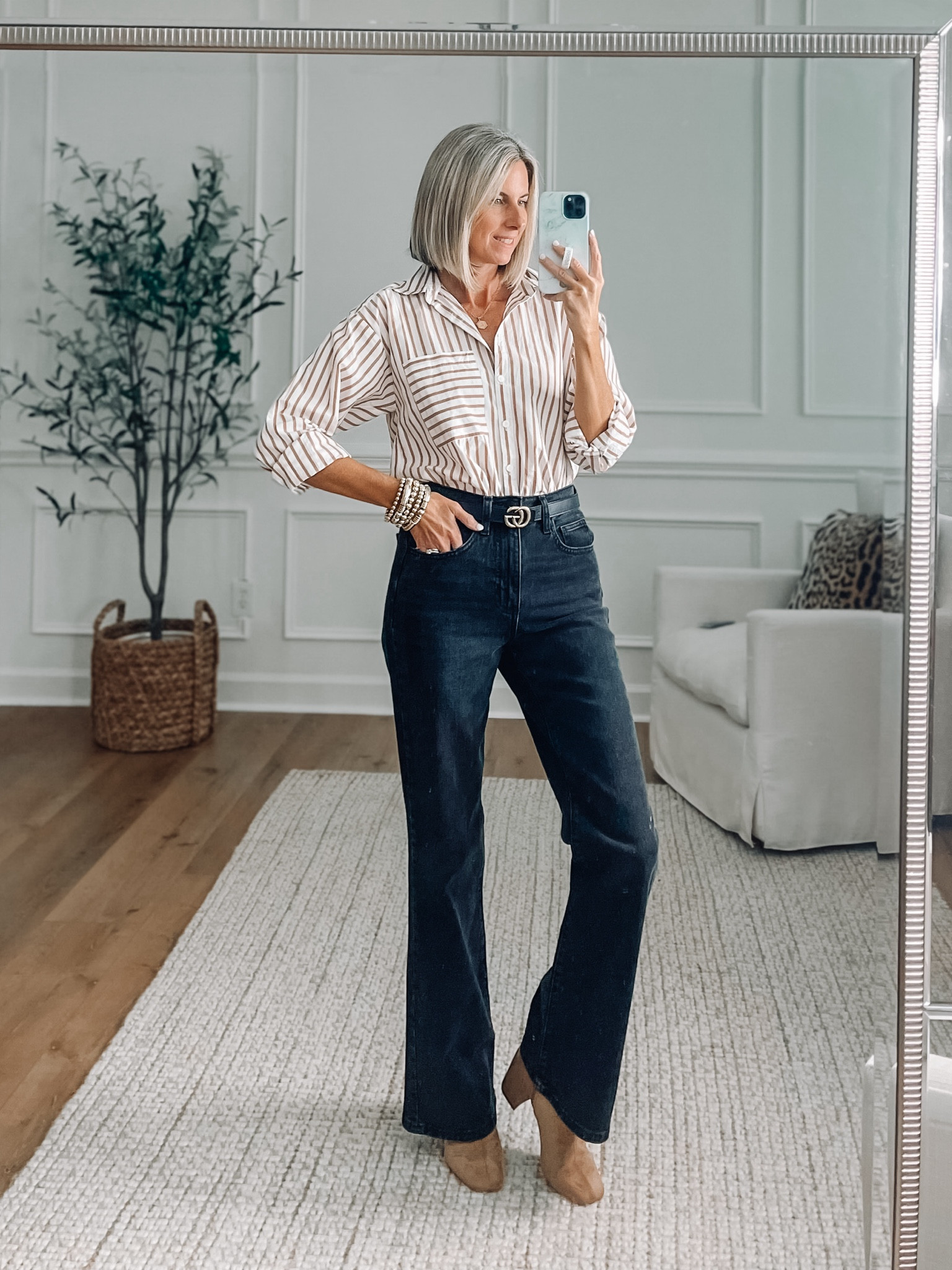 High rise black flare jeans - wearing a size 4 - oversized striped button up in an xs 



Target outfit 
Loft outfit 
Fall fashion 
Fall outfit ideas 
Black denim 
Black pants

#LTKFindsUnder50 #LTKStyleTip #LTKSaleAlert