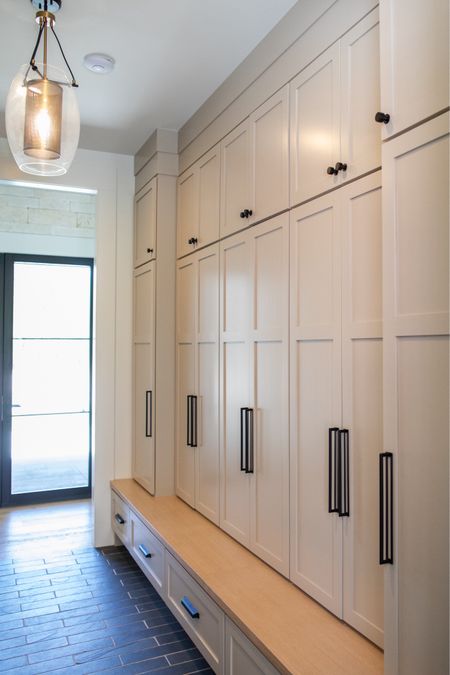 Our mudroom has a convenient wall of lockers, then of course a sink for the kids and dogs. The color of cabinets is Stone Hearth by Benjamin Moore and we used a slate tile for the flooring.

#LTKStyleTip #LTKHome