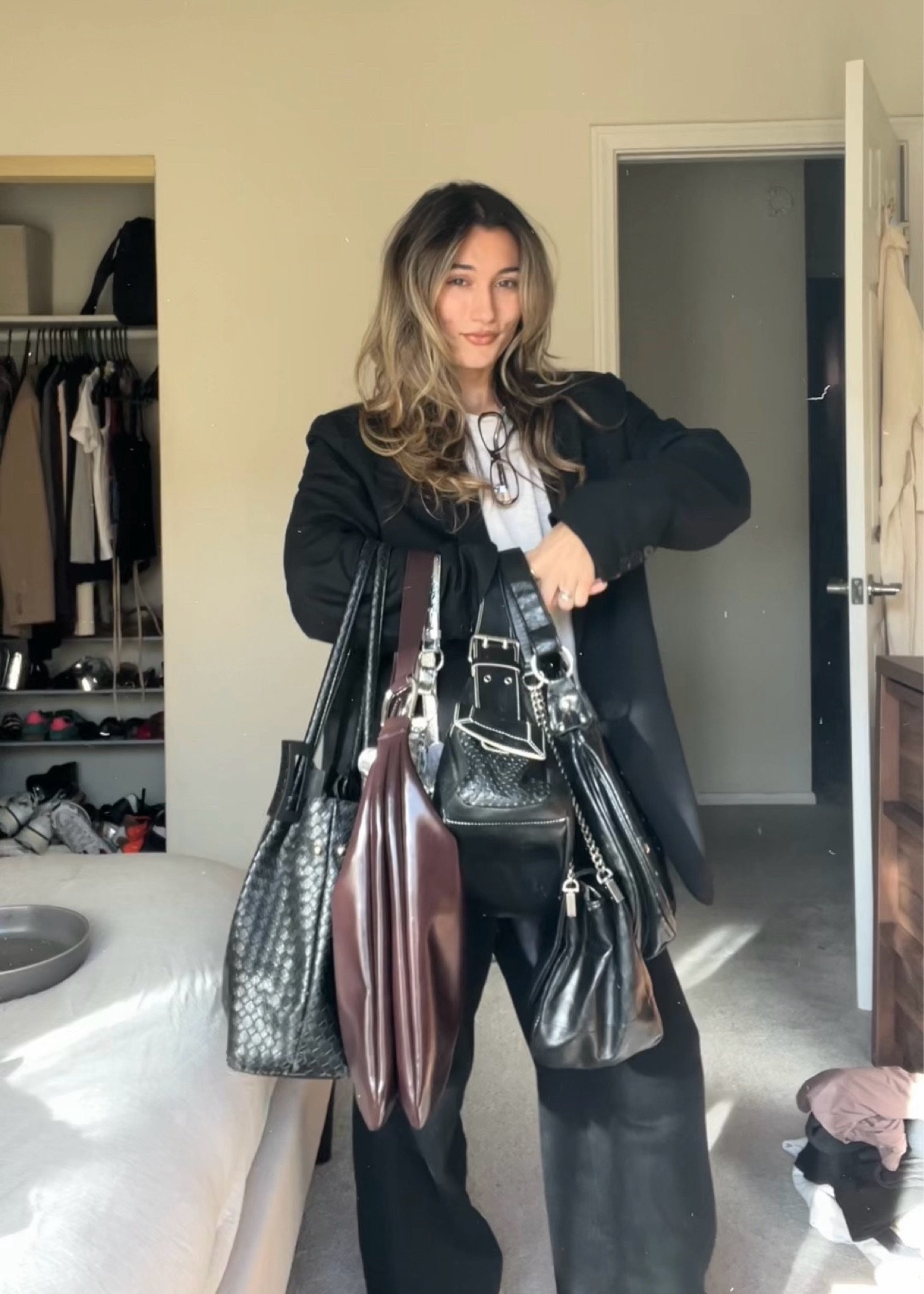 Current F/W bag rotation! Most are a few years old, so I linked a ton with a similar vibe🖤

#LTKStyleTip #LTKItBag #LTKSeasonal