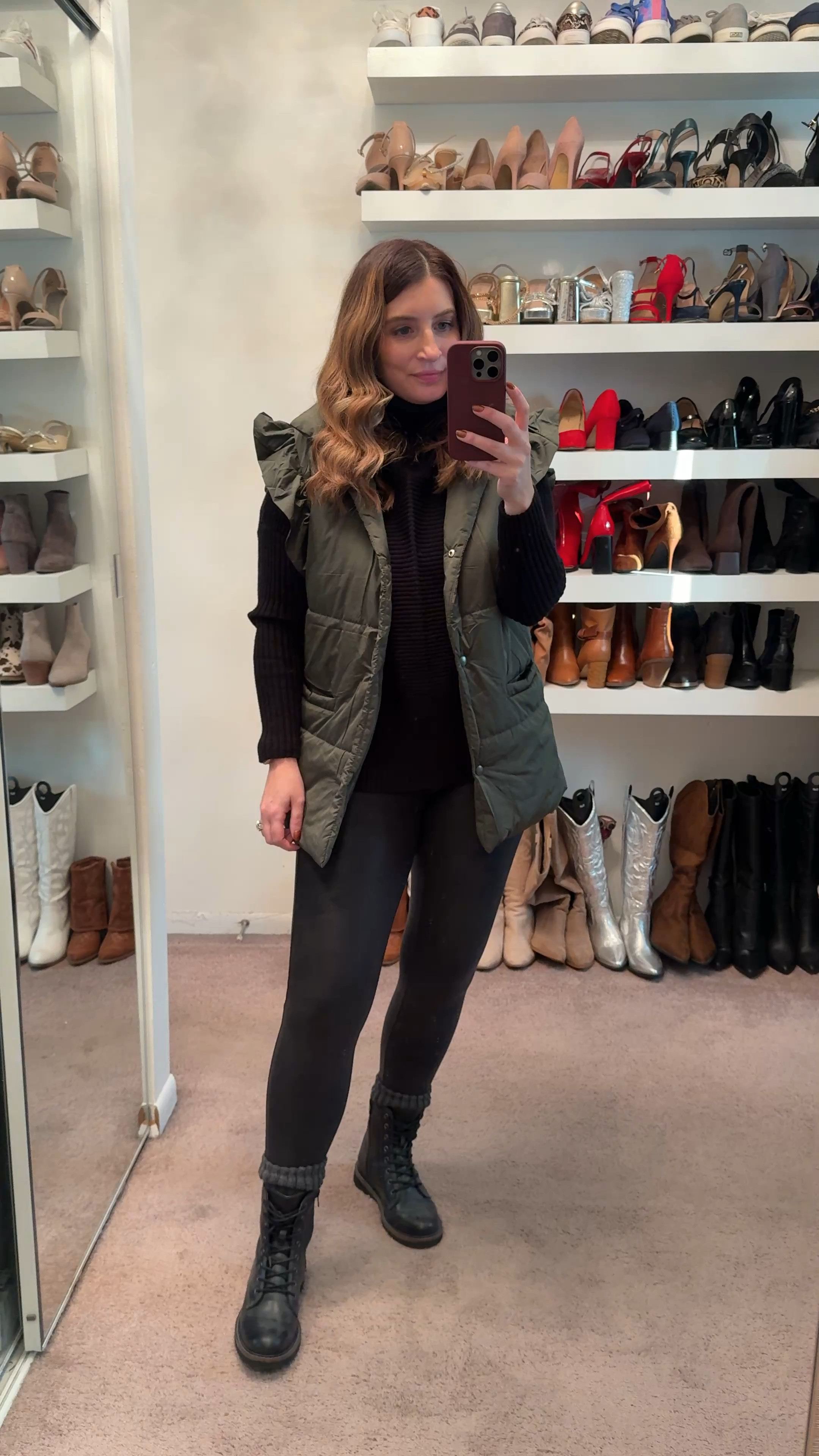 Spanx fleece lined faux leather, Winter outfit idea, ruffle sleeve puffer vest, oversized sweater, black combat boots, winter outfits

#LTKStyleTip #LTKWatchNow #LTKFindsUnder50