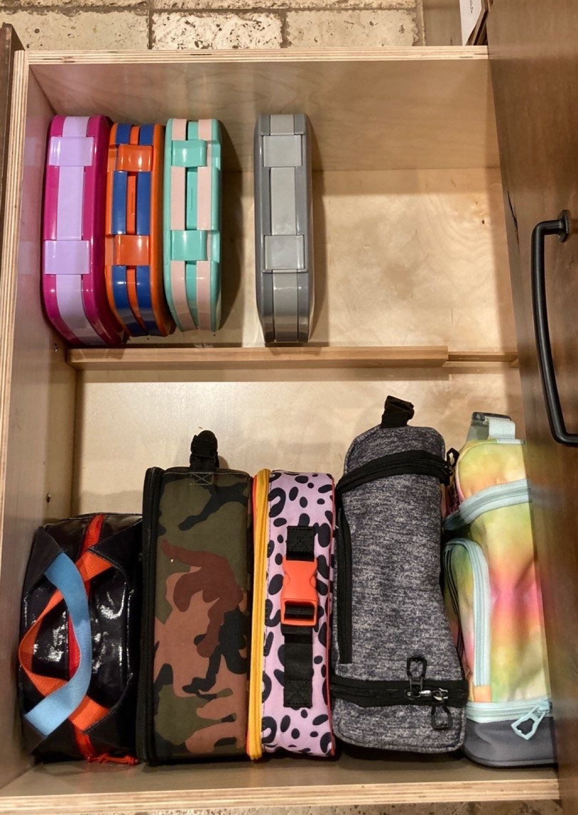 How are you organizing your lunchboxes for back to school? Using a simple drawer divider makes space for everything and lines it all up just right! 

#home #organize #organizewithtracy #kitchen

#LTKhome