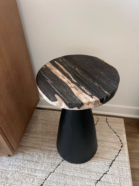 This table is just absolutely stunning!!!! 

side table, organic modern, living room, petrified wood 

#LTKhome #LTKstyletip