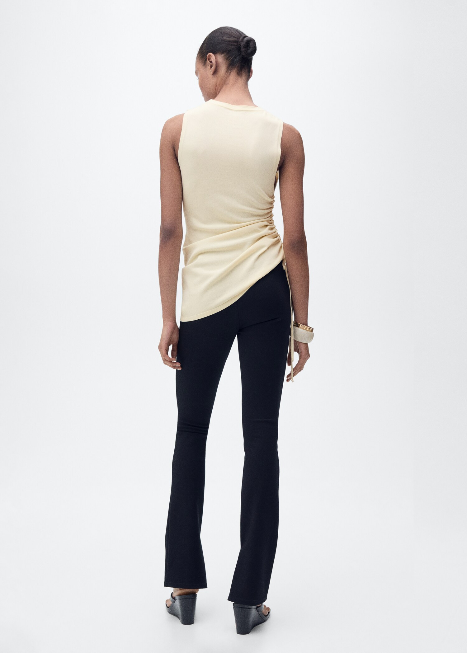 Side gathered knitted top - Women | MANGO United Kingdom | MANGO (UK)