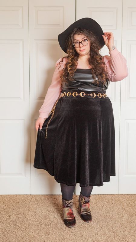 Plus size pastel pink black leather winter outfit 

#LTKSeasonal #LTKstyletip #LTKcurves