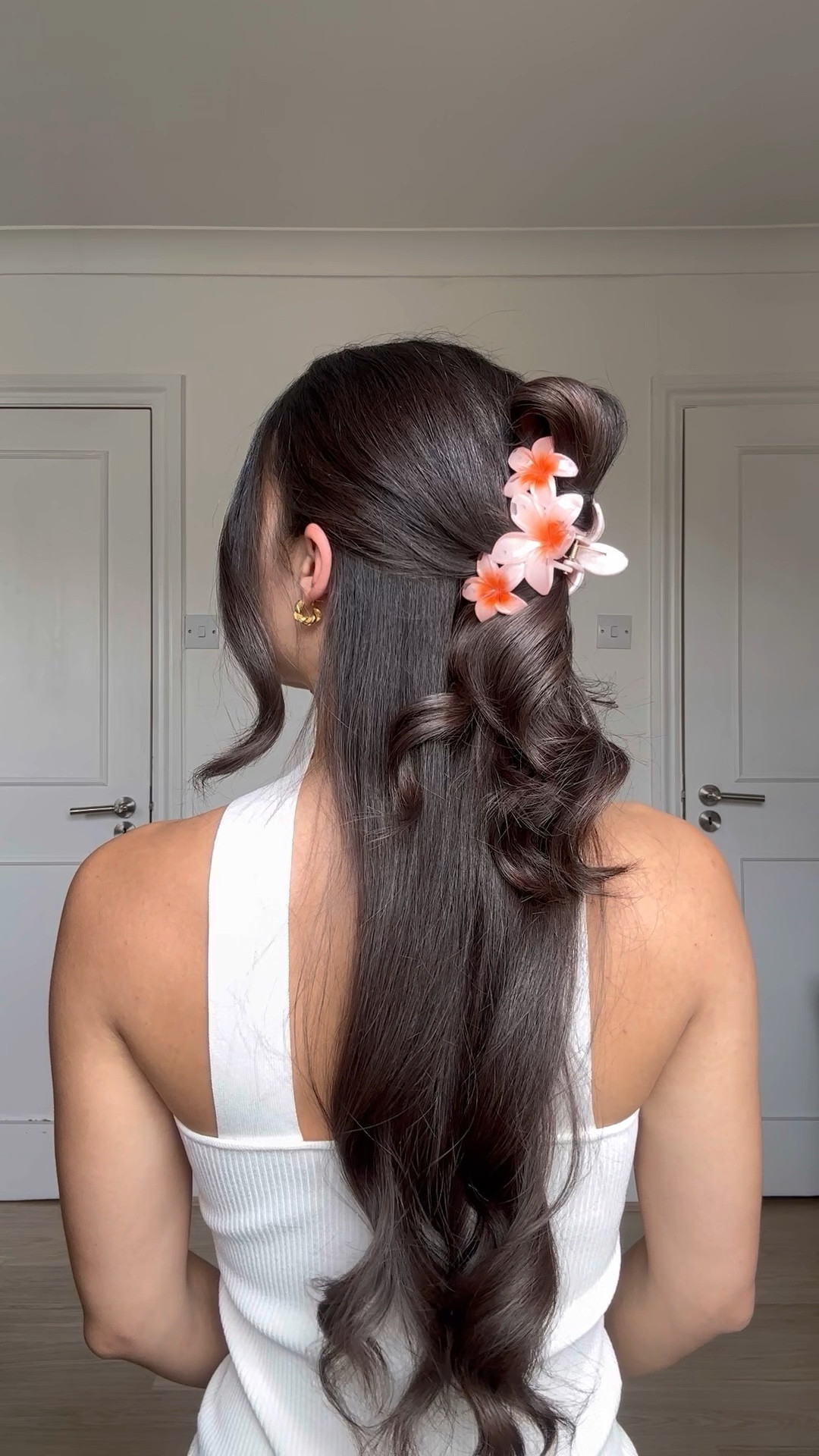 Love a flower claw clip for the summer! Try this hack to elevate your half pony hairstyle. 

#LTKstyletip #LTKSeasonal