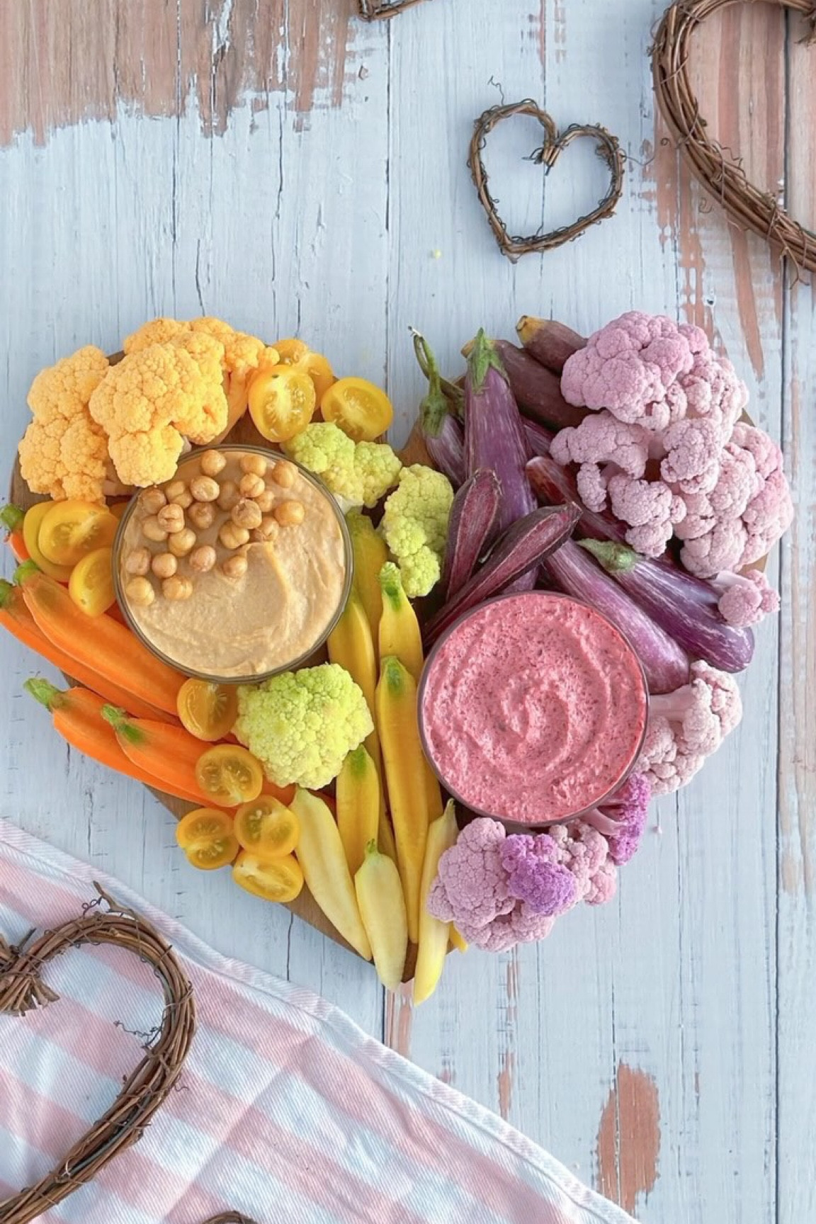 Switch things up with a unique board shape—like this heart-shaped board. Instead of the usual cheese and charcuterie, try colorful crudités in vibrant, unexpected hues. 

HOT TIP: Keep edges neat to keep the board’s shape clean and visible!

#charcuterieandthings #charcuterieboard #cheese #foodstyling #diyfood #crudités