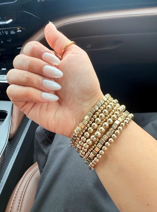 These gold bracelets and press on nails are the perfect way to add a touch of luxe to your look for less  

#LTKmomlife #LTKgrwm #LTKootd