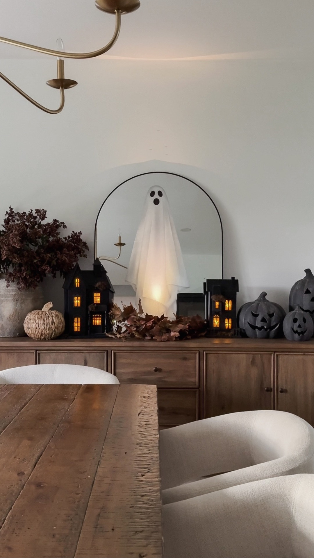 These ghost decals easily elevate your home for Halloween! Place on mirrors and glass, these decals will be a hit with guests. Add battery-operated lighting for a holographic effect. I also styled my sideboard with rustic pumpkins, and fall branches.

#LTKHome #LTKSaleAlert #LTKSeasonal