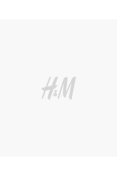 Conscious choiceRobe courte en tissu à l’aspect légèrement brillant. Modèle avec encolure e... | H&M (FR & ES & IT)