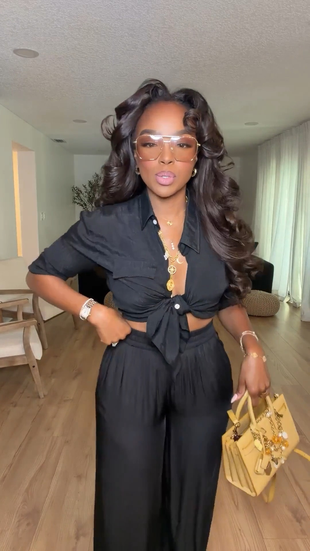 Hi babes!

This all black look is such a vibe 🖤 The tie-front top paired with the flowy pants gives that effortless elevated feel while still being comfortable and easy to wear all summer long.

Where to wear this:
Vacation dinners
Girls night
Date nights
Rooftop drinks
Summer events

I love outfits like this because every piece can be styled so many different ways — the top works with denim, skirts, or trousers and the pants instantly elevate even the simplest basics, so your cost per wear drops fast.

Everything is linked below

xx Kira | Kira’s Fashion Finds

34D - 27 - 40 | size small or 4

#LTKgrwm #LTKootd #LTKvlog