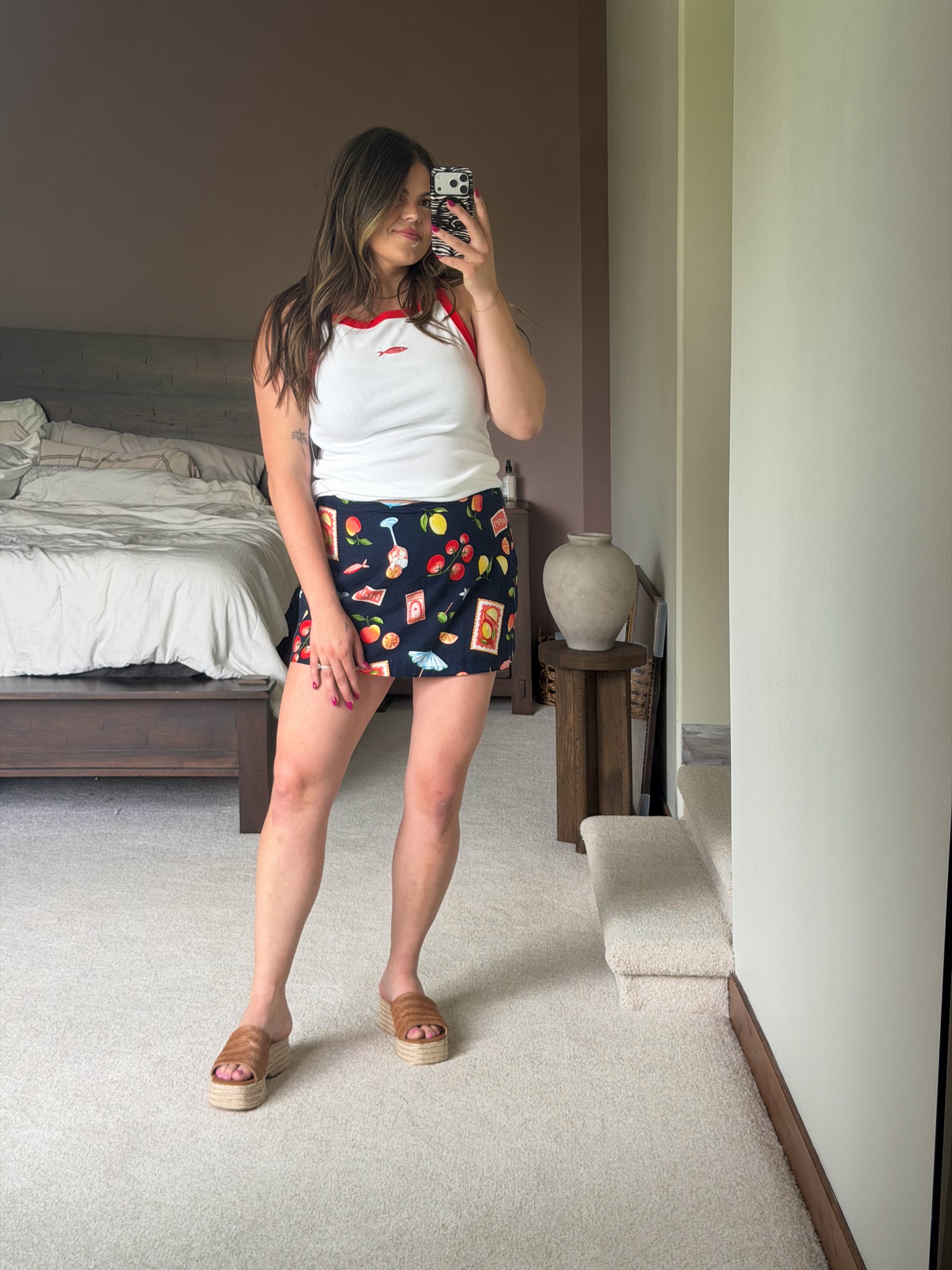 Spring or summer outfit from Old Navy! Wearing size large in the pattern linen skort enlarge in the fish embellished tank top

Europe, beach vacation, resort wear, brunch, farmers market 
Midsize, size 12, size 14, mom style, curvy outfit