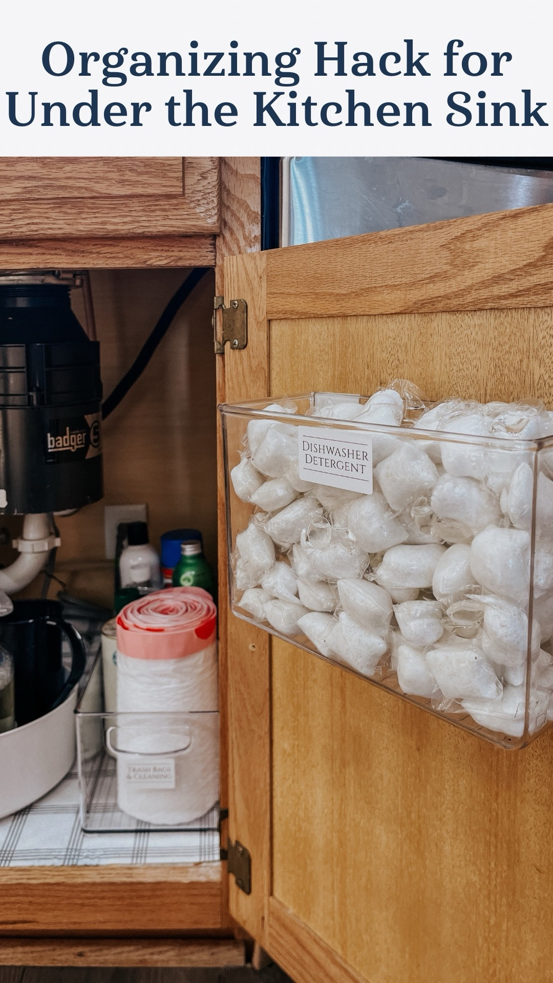 Home hack for organizing under the kitchen sink! I love this adhesive organizer for inside cabinets  