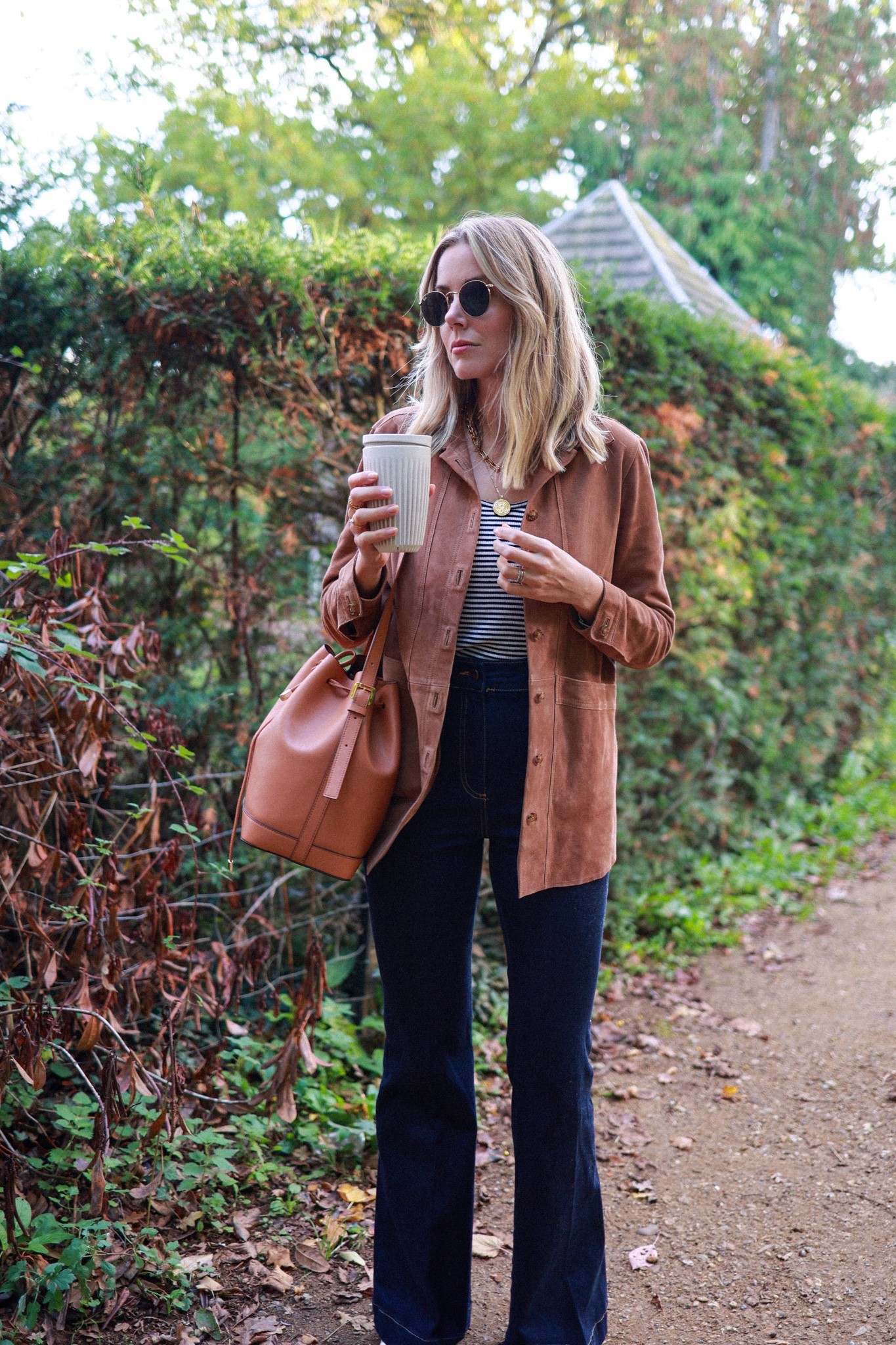 Suede jacket
Sézane jacket 
Bucket bag 
High waist jeans 
Striped top 
Flared jeans 

#LTKSeasonal #LTKeurope #LTKstyletip