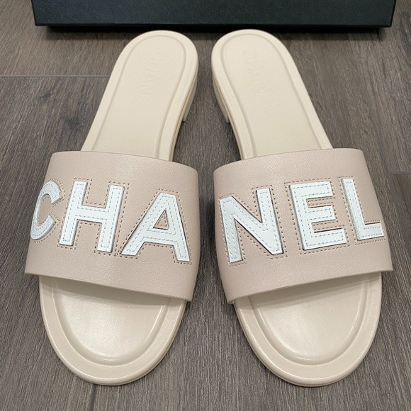 2023 CHANEL CHA NEL LOGO BEIGE LEATHER FLAT SHOES SLIDES MULES 38 | Poshmark
