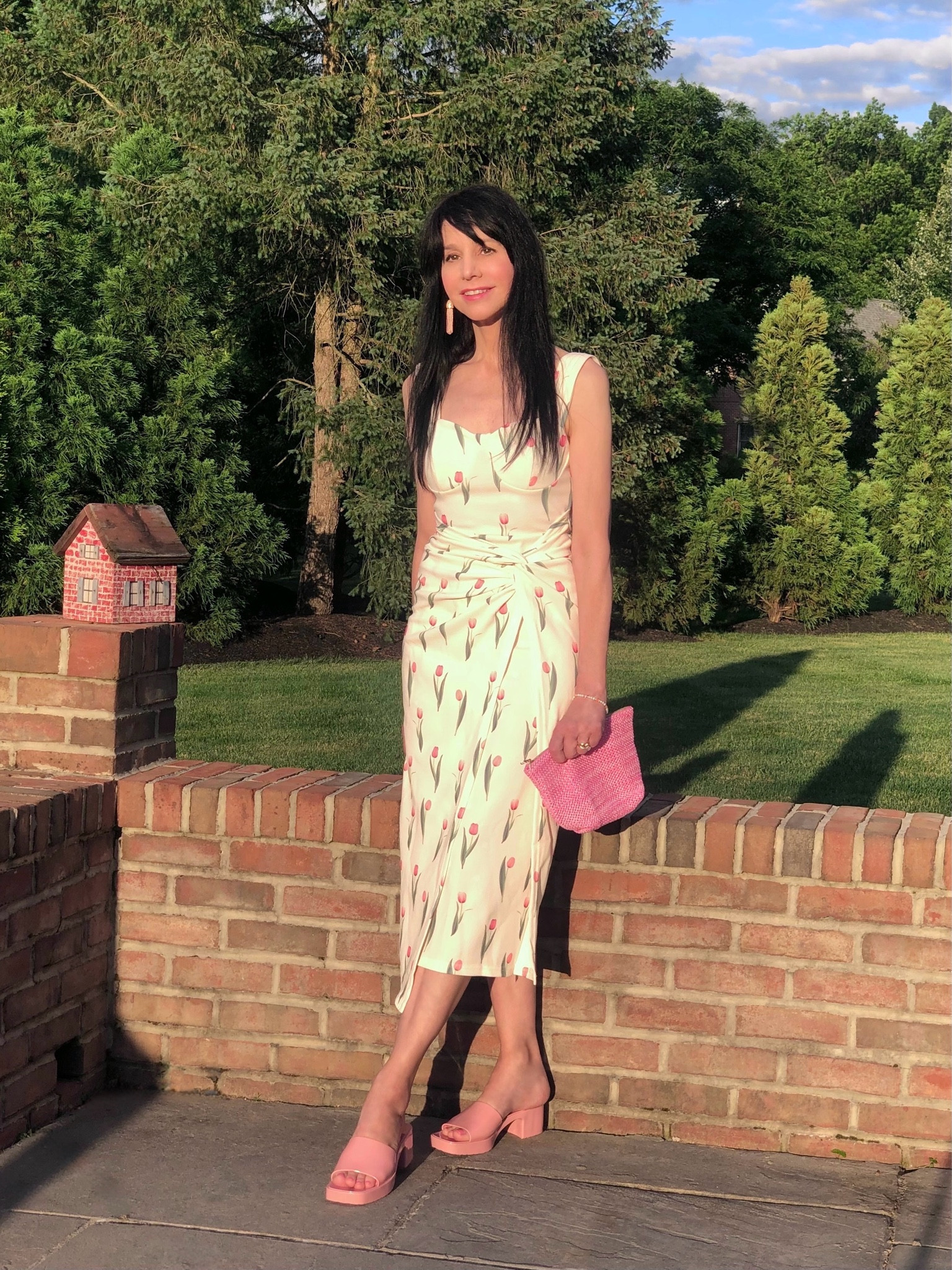 The first official weekend of summer definitely brought us  extreme heat and humidity! I’m not complaining because it means I get to live in summer dresses, like this floral, twist-front, bustier-like cami dress! The tulip print is so pretty. I also love that the style is different from a typical sundress, giving more variety to my wardrobe! It is perfect for a summer date night! 

I hope everyone is finding ways to stay cool and enjoy the beginning of summer!
