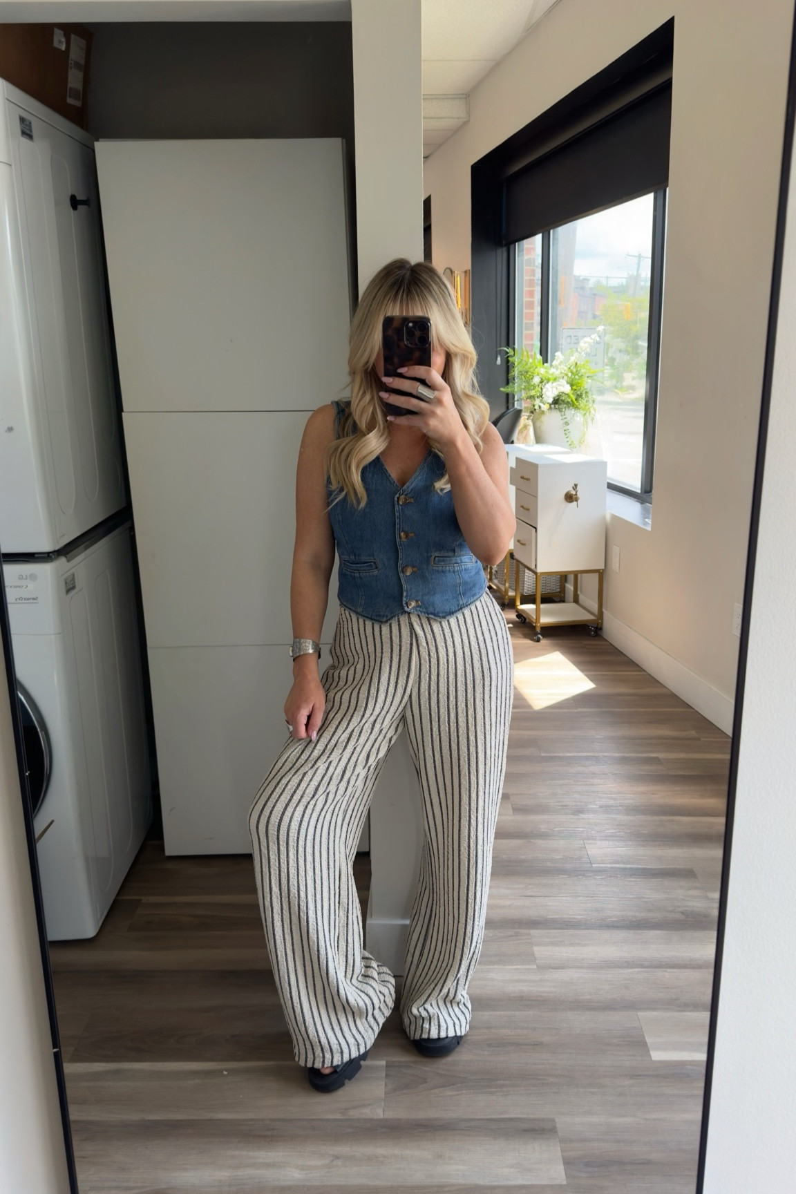 Denim vest size small 
Black and white striped pants size small 
Black platform sorels size 7