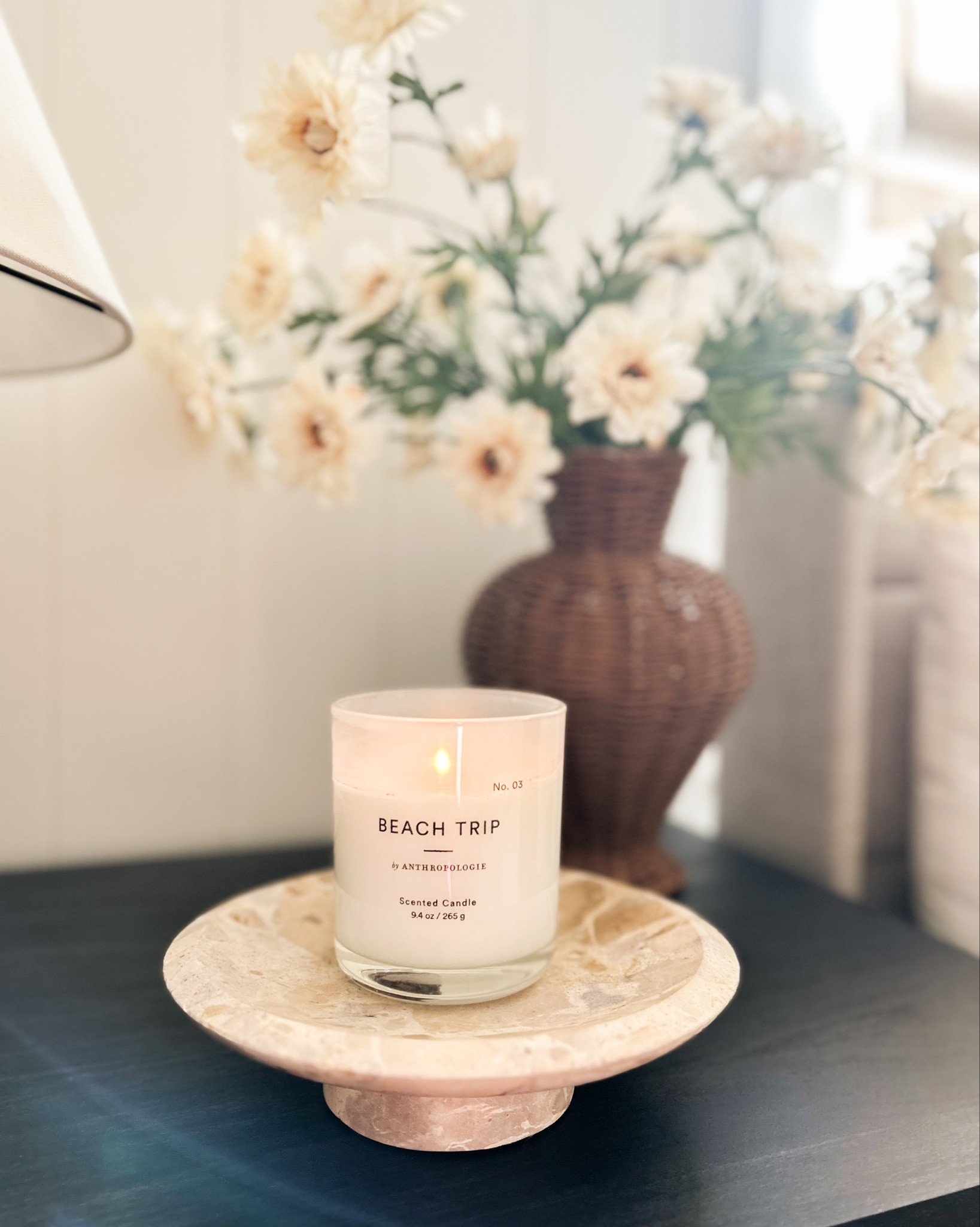 Currently: Dreaming of summer. 💭This @Anthropologie candle smells amazing. 🕯️🥥🌴🌺

Candle Scent: Beach Trip (Floral Coconut) 

Nightstand styling, spring stems

#LTKFindsUnder100 #LTKGiftGuide

#LTKHome