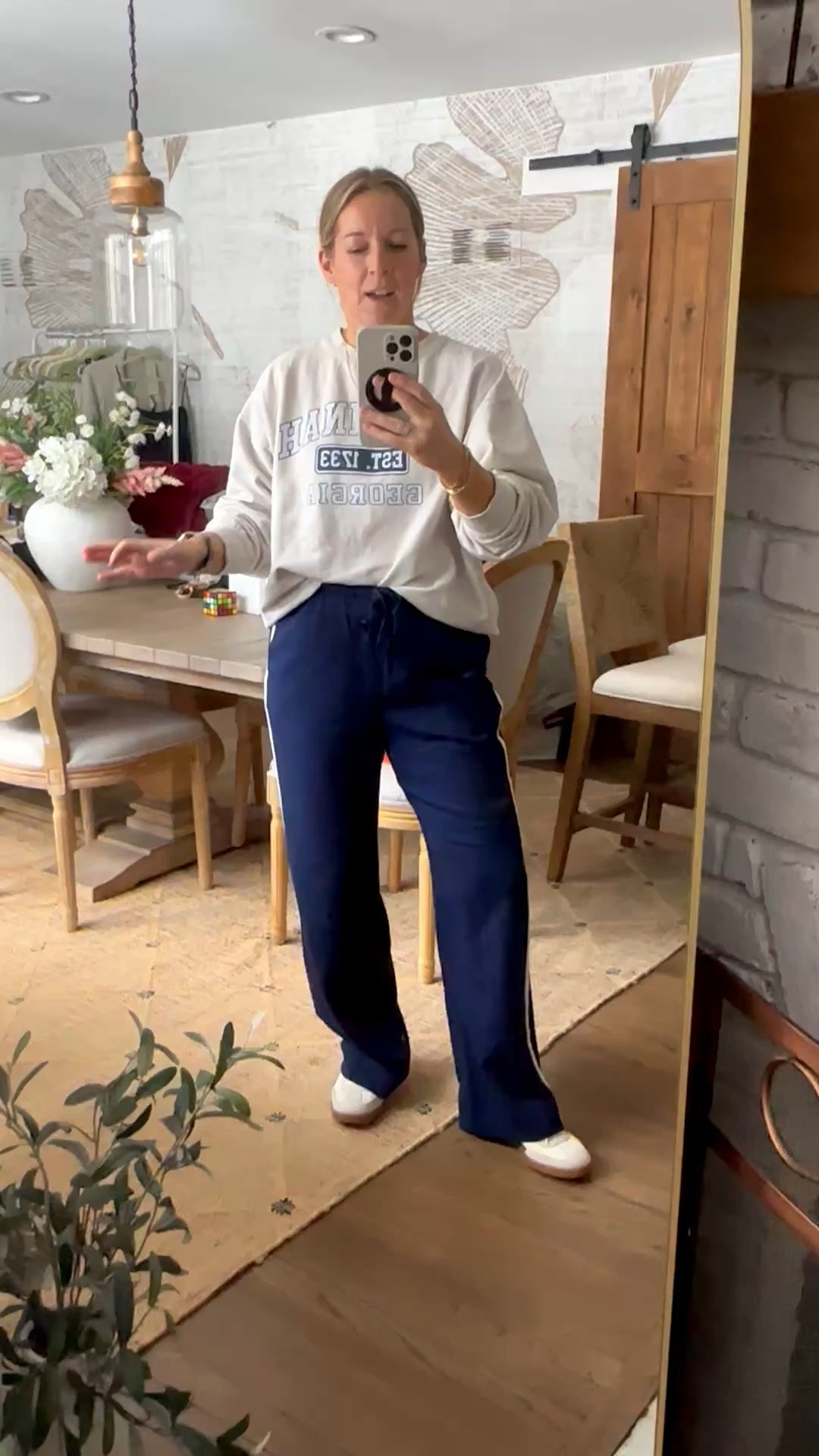 I honestly feel so much more put together when I style sweats then when I try to dress up! I am wearing a sweat sweatshirt that I got from my visit to Georgia, but I linked a couple that would match the sweatpants as well and looks super low-key and chill. These pants are just like the Aritzia lodge pants. I actually have them and have shared them with you in ivory and black as well. They are so comfortable and the length is perfect for our height and I wear my true size medium. They don’t need to be steamed or ironed because I feel like they washed really nice but they steam really easily if you have to, and I just absolutely love this track pant style. I am so here for this trend! ￼

#LTKdayinmylife #LTKootd #LTKMidsize